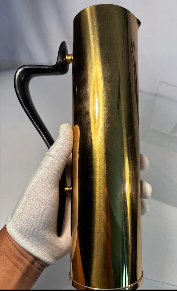 Donald H. Colflesh for Gorham Giftware Pitcher (L-845, 40 oz): This elegant modernist brass pitcher with its striking black handle was designed by Donald H. Colflesh for Gorham and produced under the Giftware line. It’s marked “Gorham Giftware L?845 40 OZS&rd