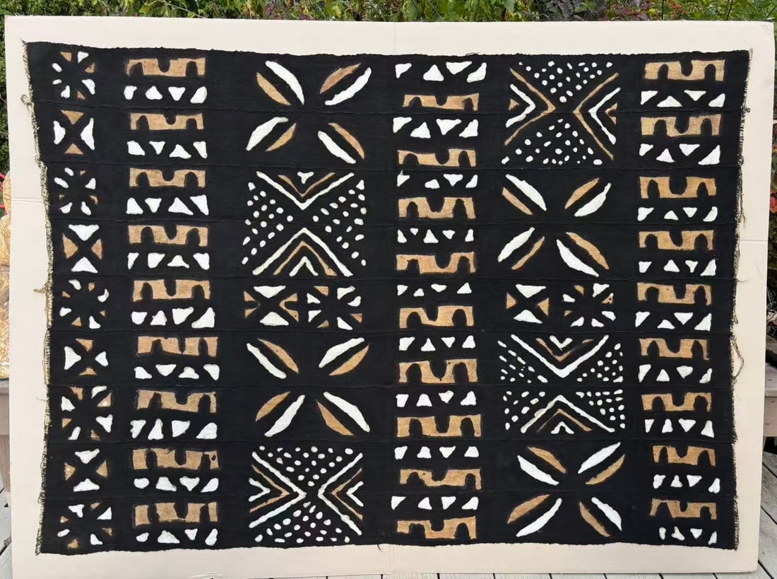 African Bogolanfini Mud Cloth Textile, Mali, 70 × 50 in: Handwoven and hand-dyed cotton mud cloth (bogolan or bogolanfini) from Mali, featuring traditional geometric Bamana tribal motifs in black, ochre, and white pigments. Each panel is individually hand-s