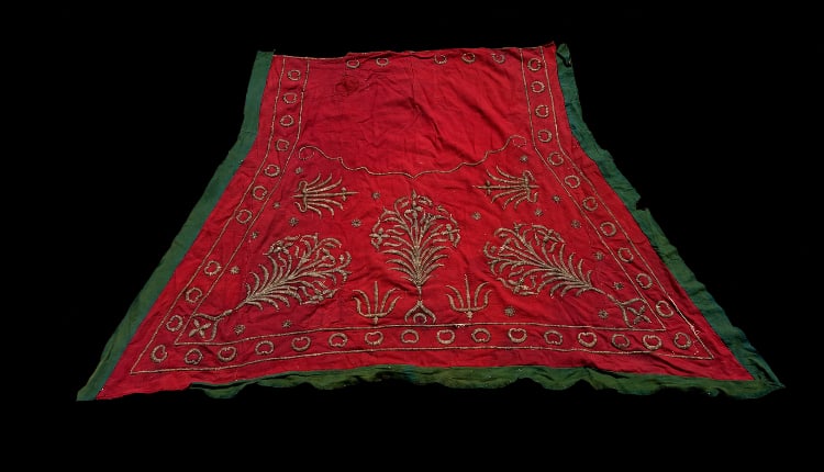 Antique Ottoman Bindall? Red Silk Metallic-Thread Embroidered Textile Panel 19th century: An antique Ottoman Bindall?-style textile panel, probably dating to the late 19th or early 20th century. Worked on a rich red silk ground, the panel is decorated with elaborate gold-toned metallic-thr