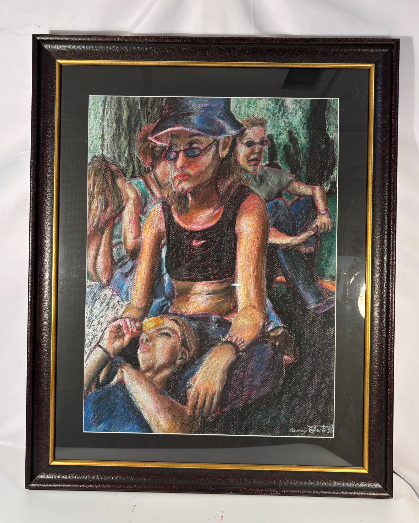 Signed Contemporary Figurative Painting, Group of Figures: Signed contemporary figurative painting depicting a group of seated figures in an outdoor setting. The composition centers on a female figure wearing a cap and sunglasses, with additional figures