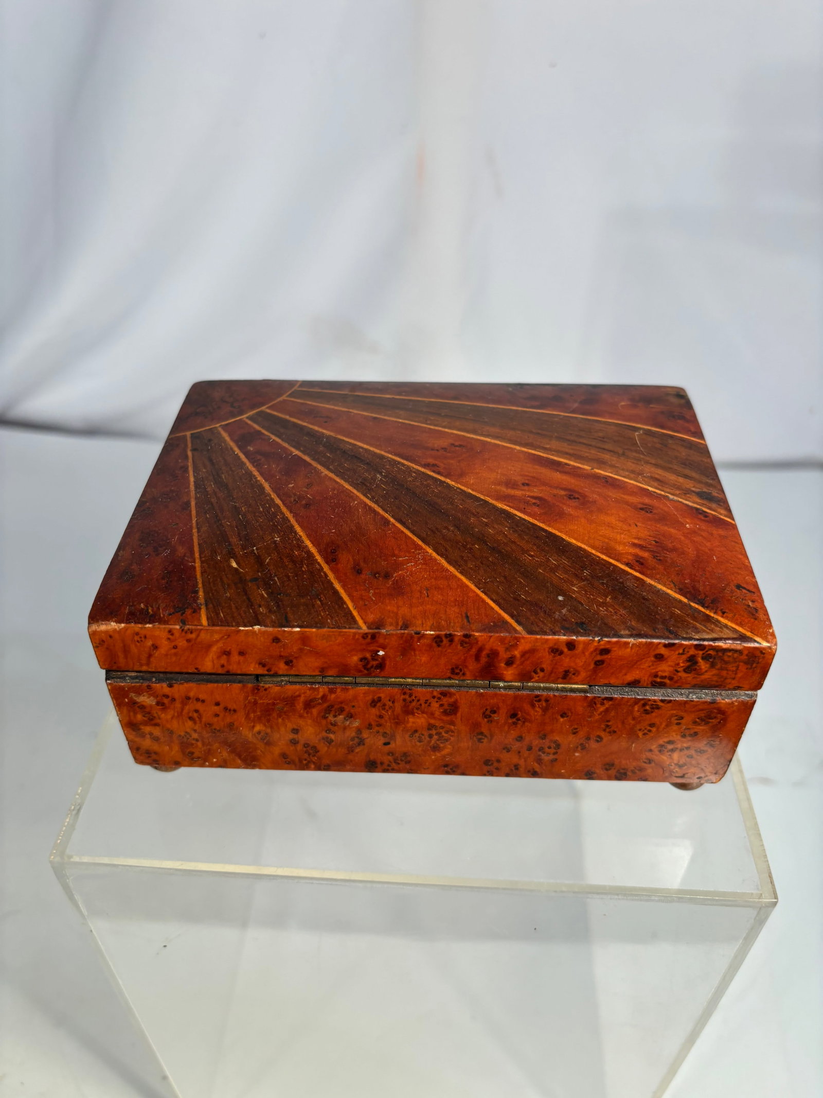 Vintage Burl Wood Mechanical Musical Jewelry Box with Marquetry Inlaid Lid: Vintage burl wood musical jewelry box featuring a richly figured burl veneer case with an elegant fan-pattern marquetry lid. The interior contains a mechanical wind-up music box movement alongside a s