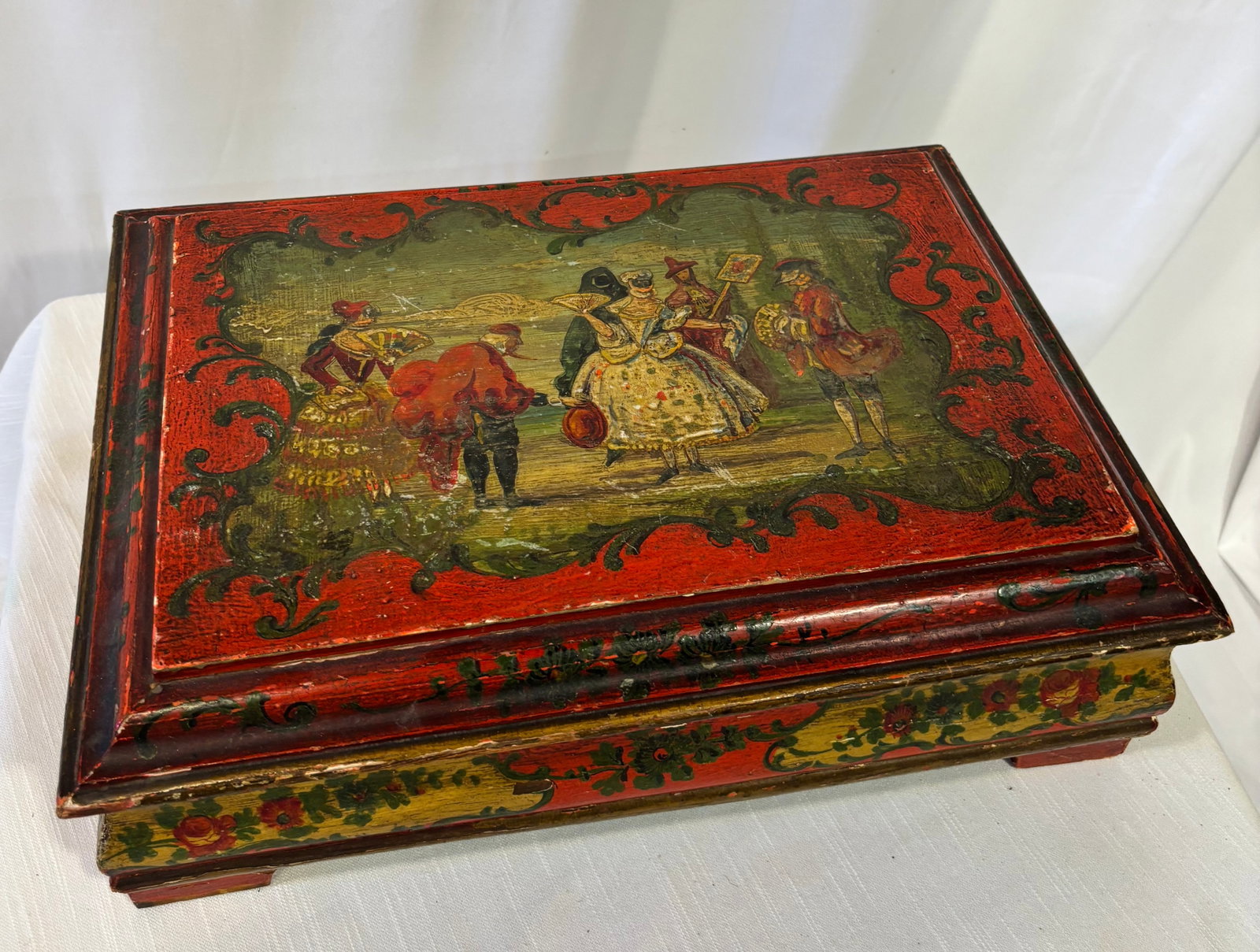 Italian Florentine Revival Polychrome-Painted Wood Jewelry Box: A vintage mid-20th-century Italian Florentine Revival wooden jewelry or keepsake box, dating to approximately the 1940s–1960s. The hinged rectangular lid is decorated with a colorful hand-painted sc