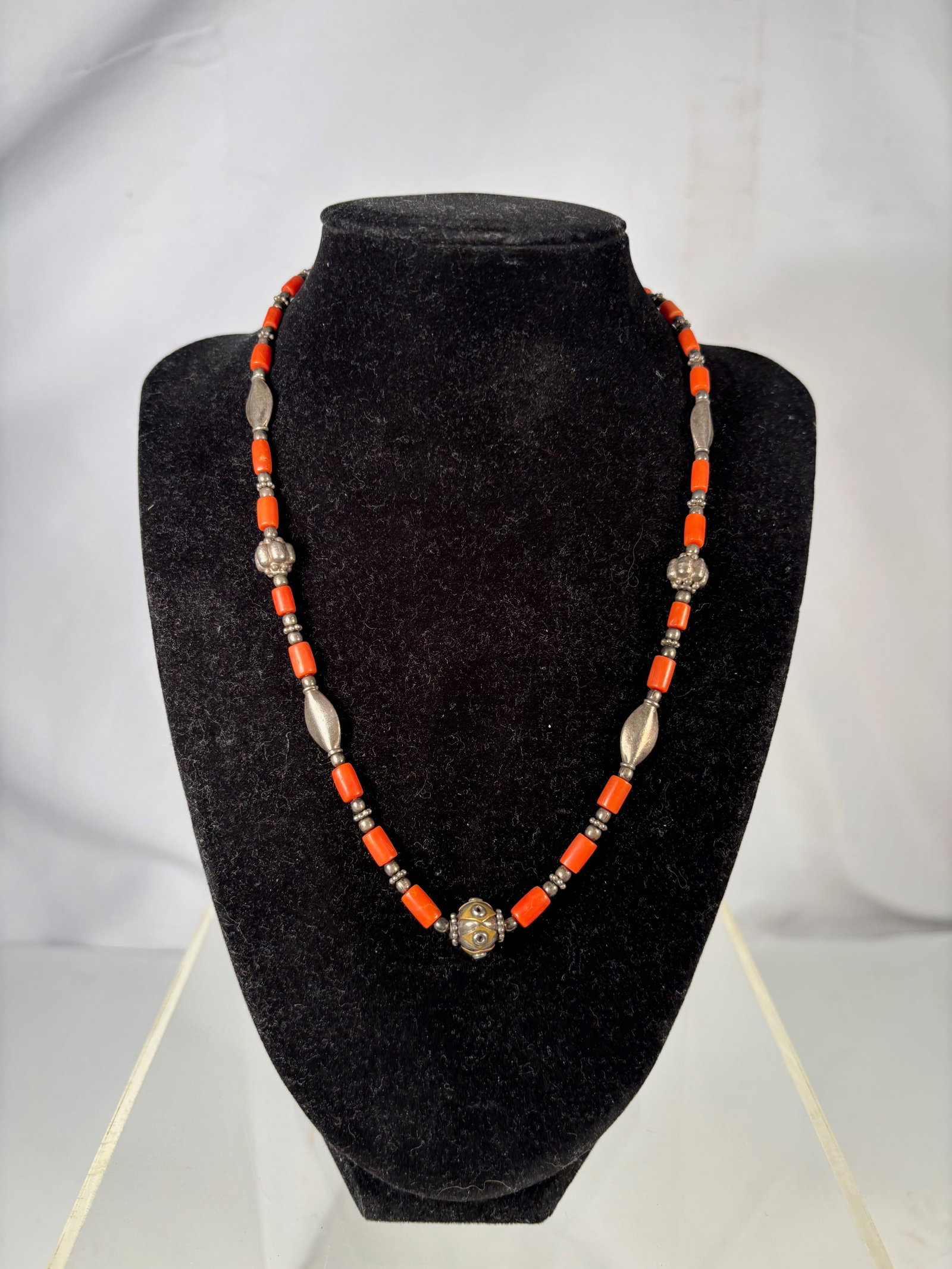 A Coral Bead Necklace with Silver Beads