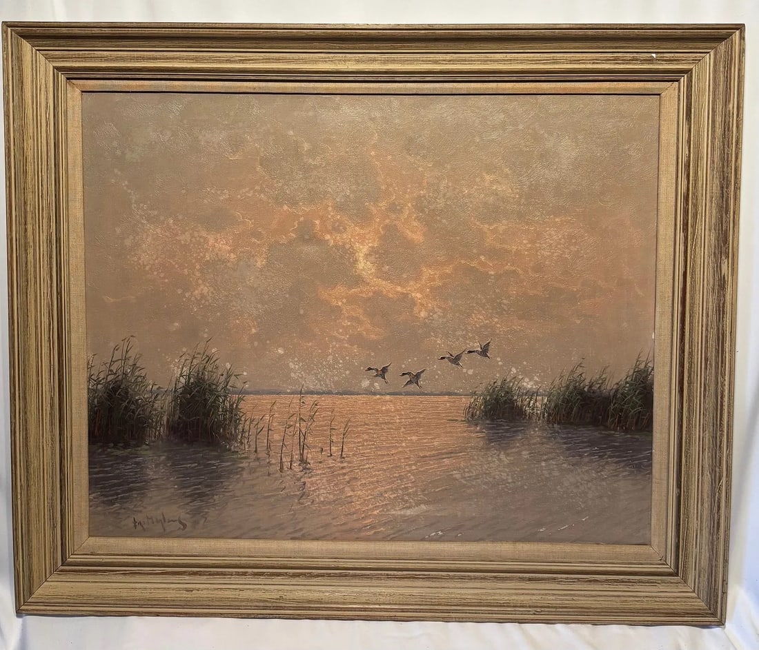 Fritz Martens (1880–1955) Ducks Over Marsh at Sunset, Oil on Canvas: Fritz Martens (Dutch-American, 1880–1955), oil on canvas depicting a tranquil marsh landscape at sunset. The composition features calm reflective waters bordered by reeds and grasses, with a flock o