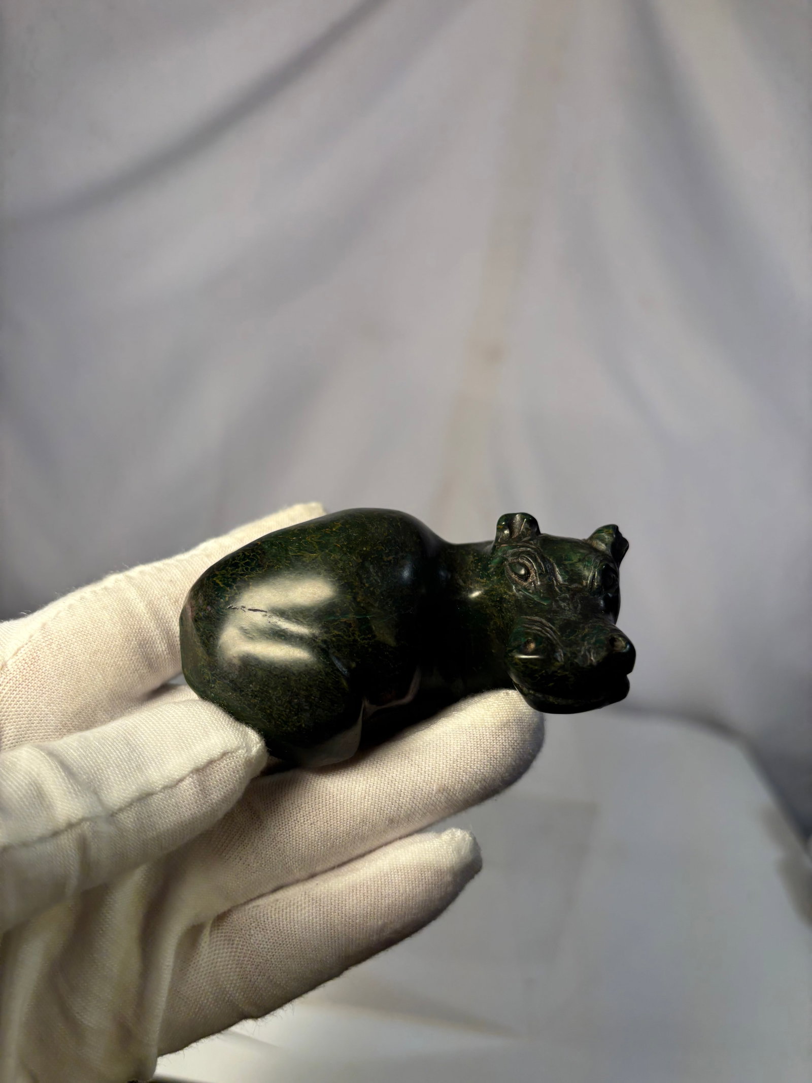 A Carved Green Stone Hippopotamus Figurine (1 of 9)