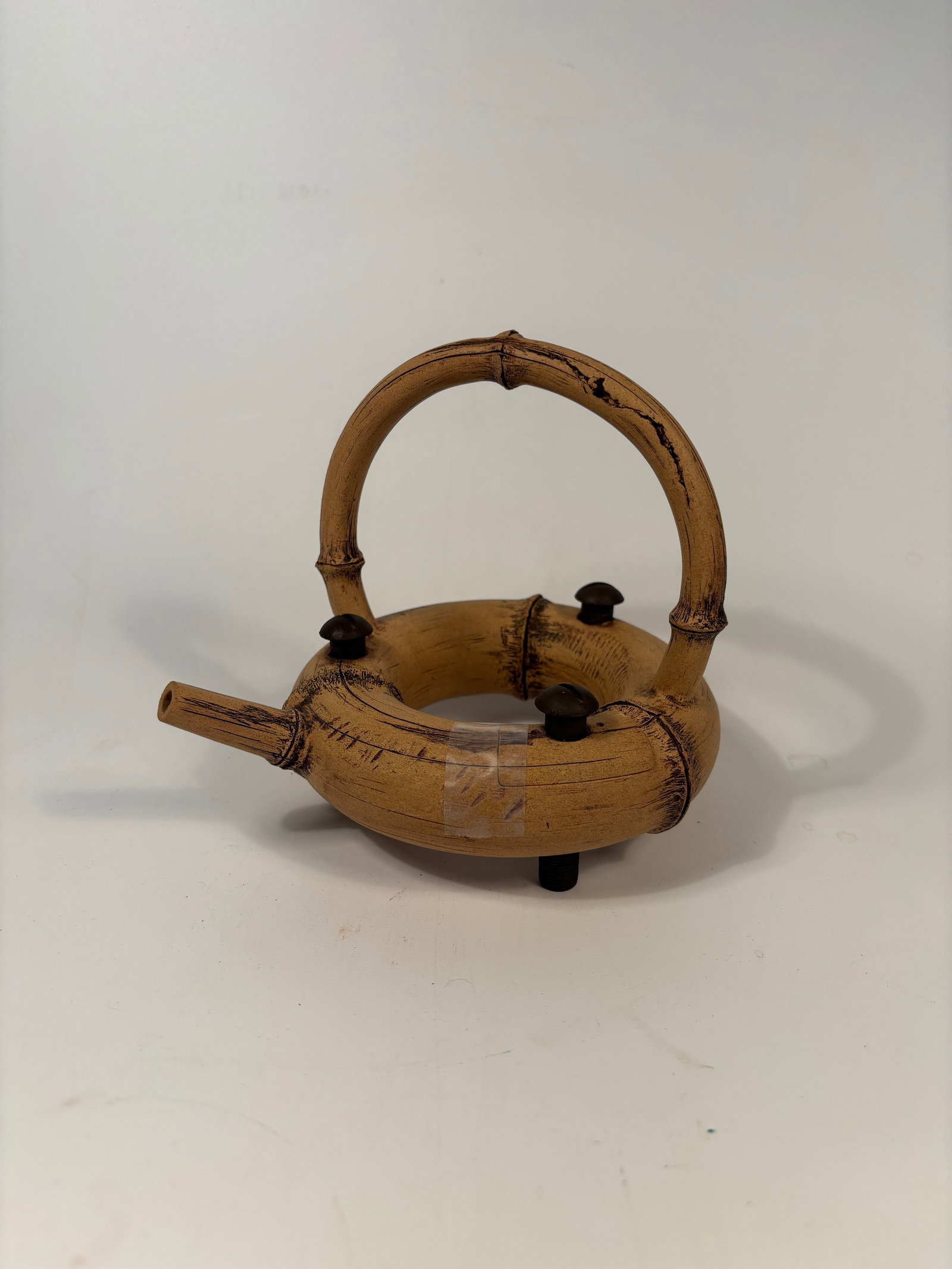 A Chinese Yixin Teapot Artist: Lu Wen Xia (b. 1966, China): Literature comparison: Compare a stoneware teapot in the form of a rice bag by the same artist, dated 1990, in the Metropolitan Museum of Art, accession number 2001.724.2a,b. Auction result comparison