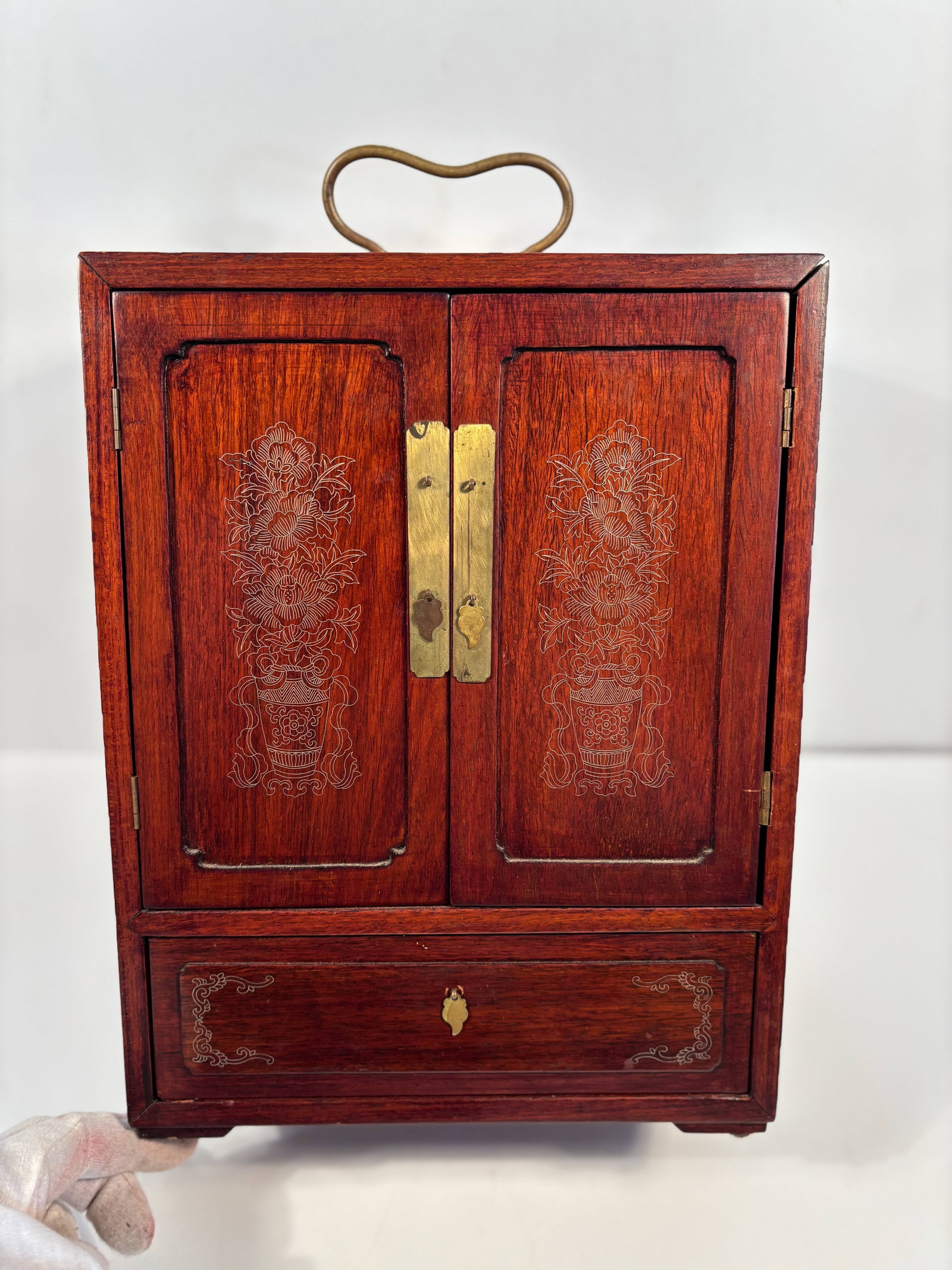 A Chinese rosewood storage cabinet