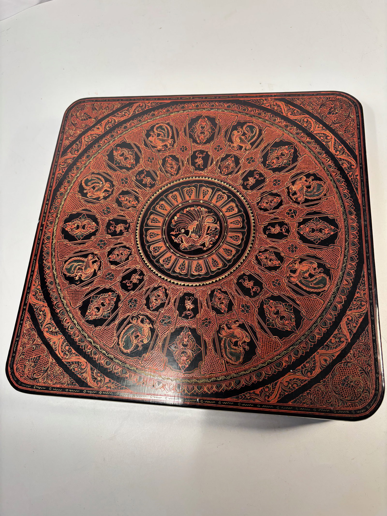 A Burmese Lacquerware Covered Box with Figural & Phoenix Motifs