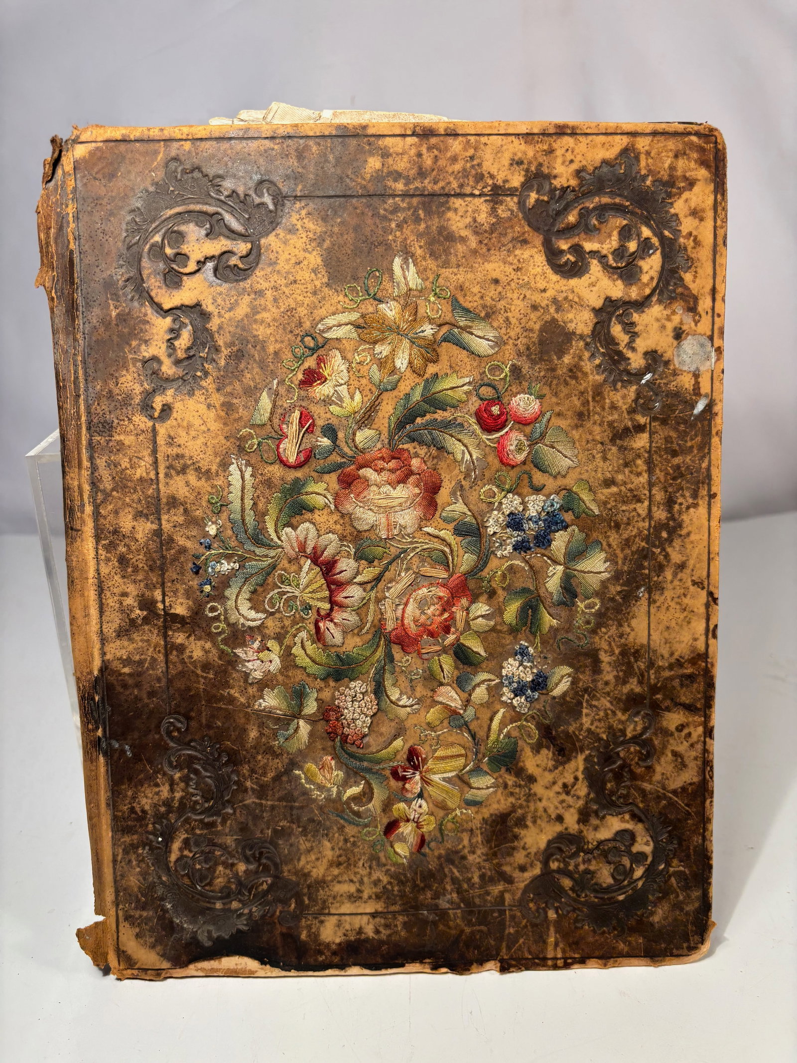 A Victorian Papier-Mâché Album with Embroidered Floral Panel, 19th Century