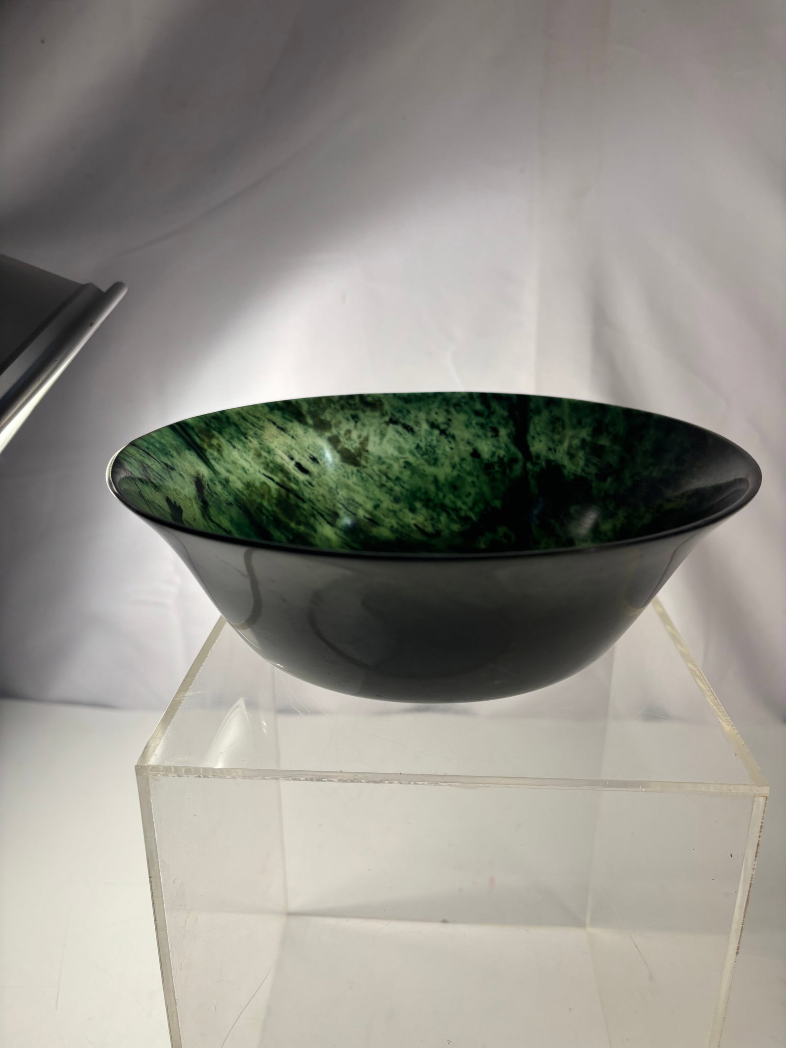 A Chinese Carved Green Spinach Jade Bowl
