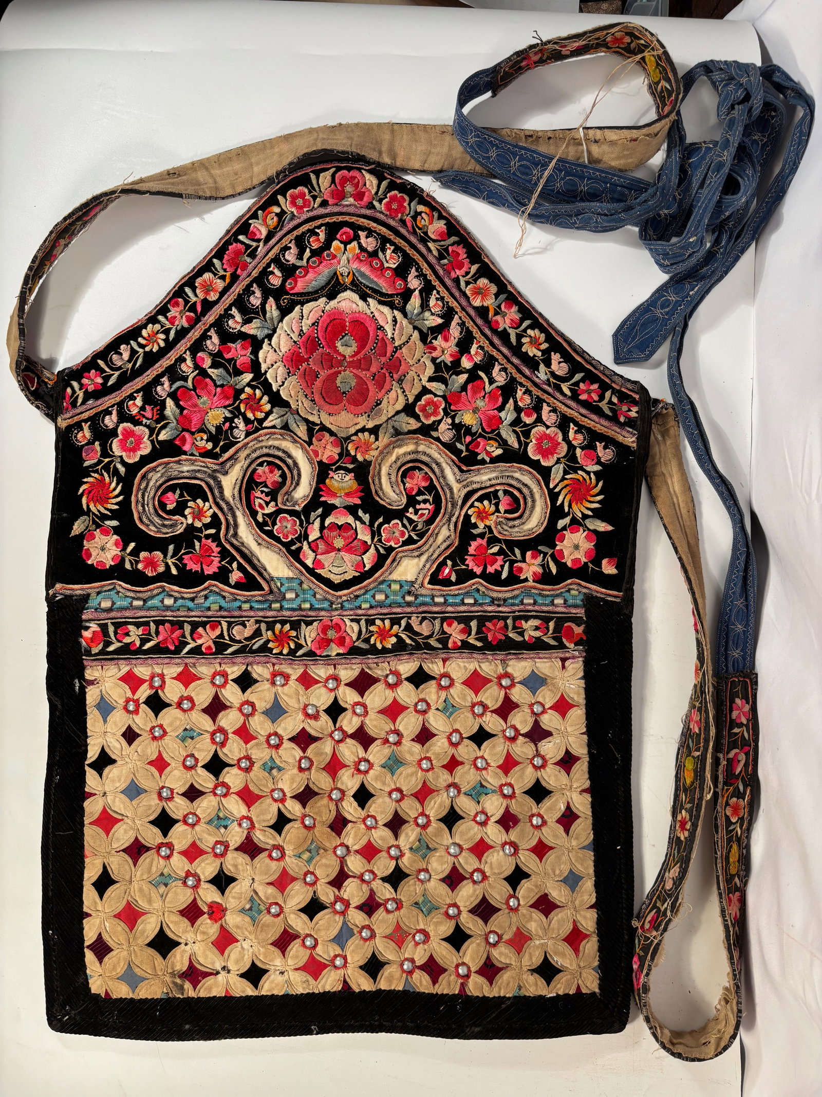 A Chinese Miao (Hmong) Embroidered baby carrier apron panel, 19th Century.