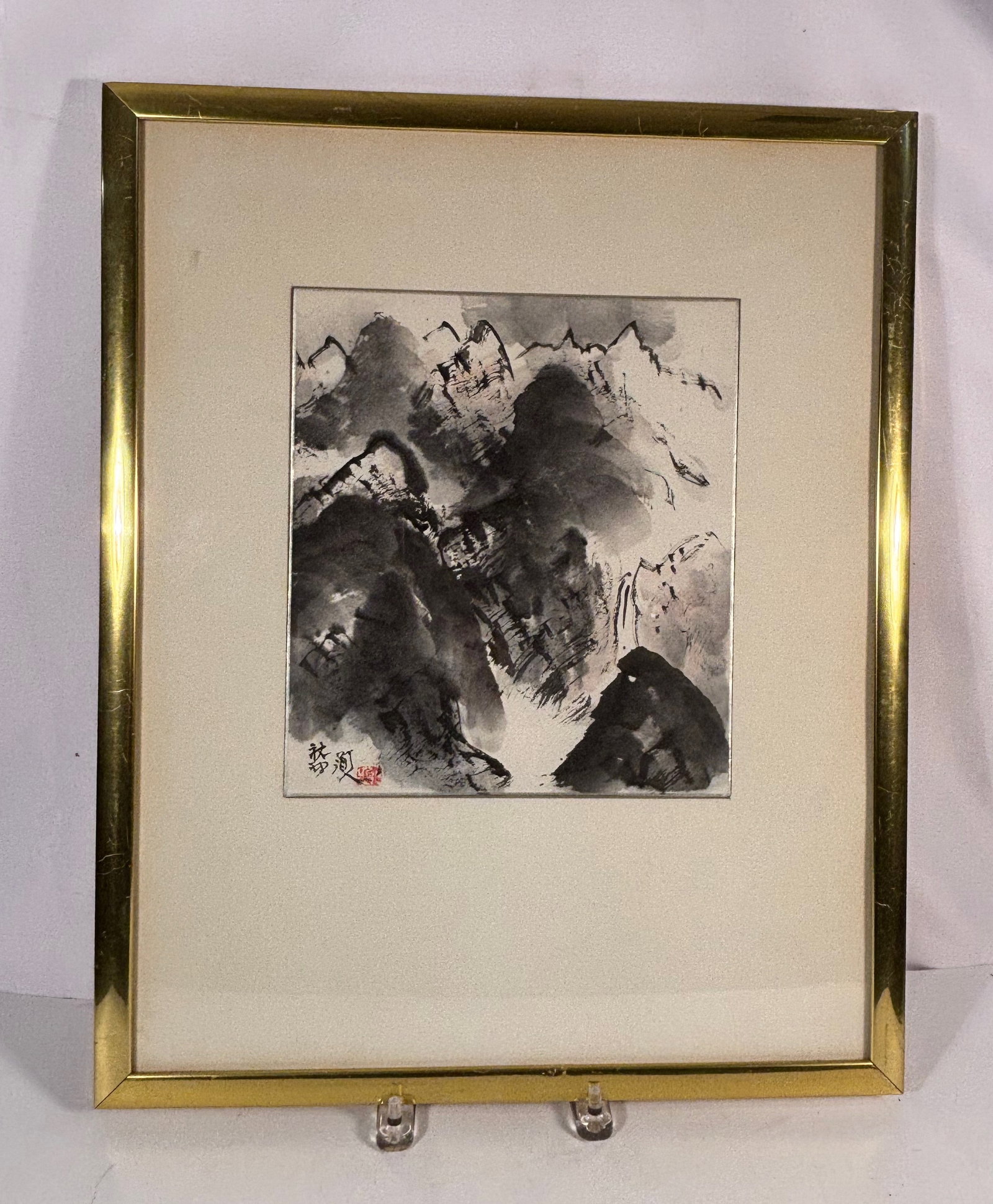 Framed Chinese Ink Landscape Painting, Signed: 20th century;Elegant Chinese ink-on-paper landscape painting signed . Rendered in expressive brushwork, the composition depicts layered mountain peaks enveloped in mist, executed in traditional shan s