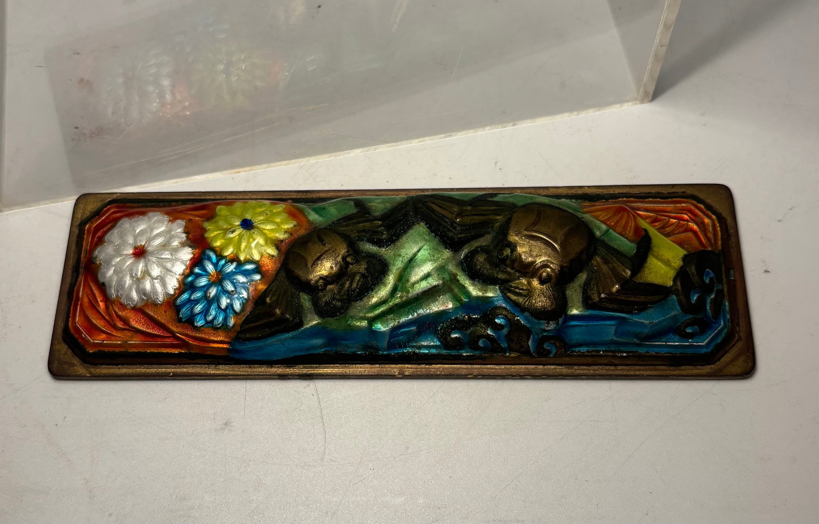Chinese Cloisonné-Style Enameled Brass Crab & Floral Scholar’s Paperweight: Chinese rectangular scholar’s paperweight crafted from brass and decorated with vividly colored raised enamel. The design depicts two crabs among aquatic plants, flowing water, and colorful chrysant