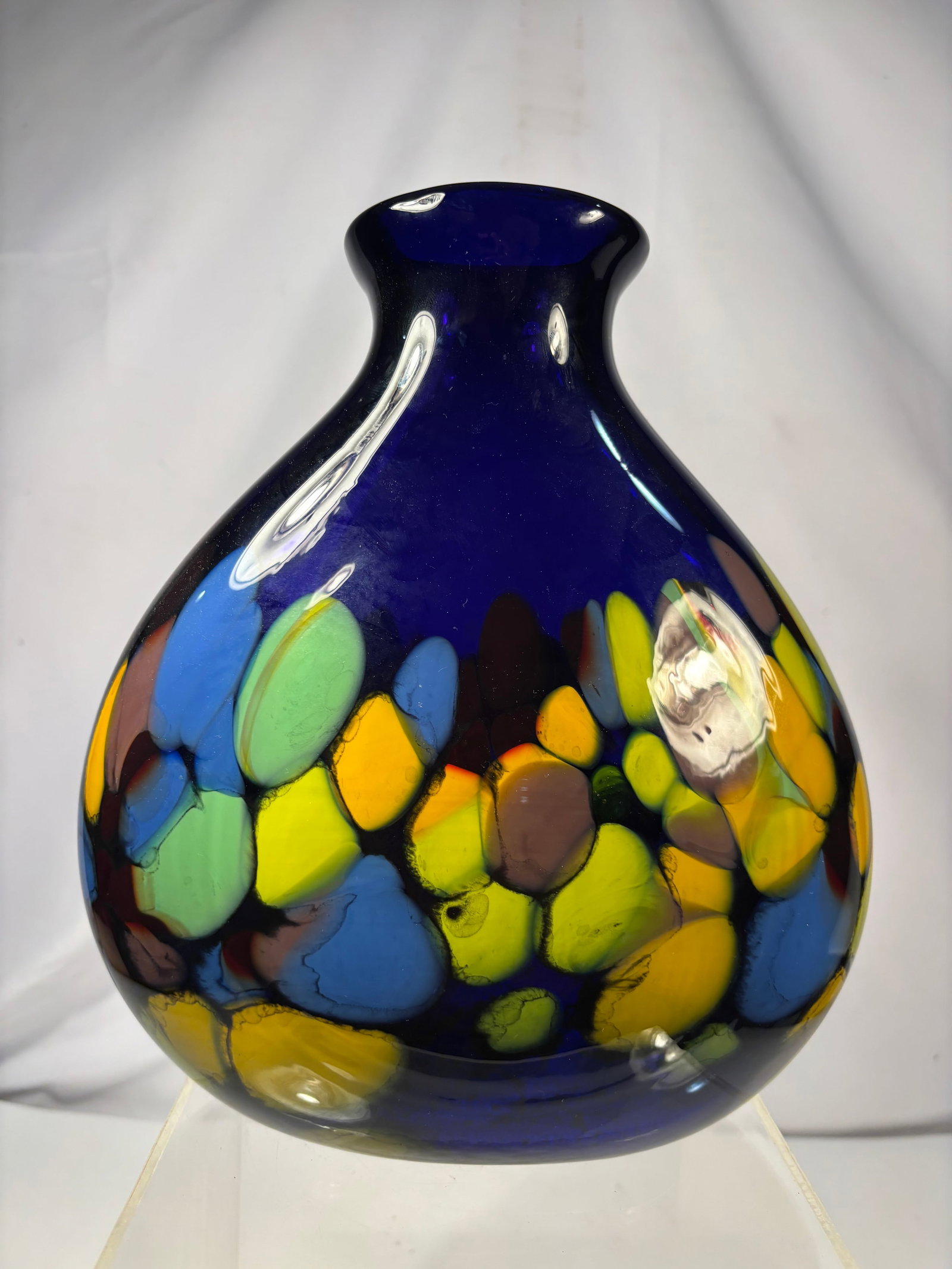 Murano-Style Hand Blown Cobalt Blue Art Glass Vase with Multicolor Murrine Decoration: Hand-blown Murano-style art glass vase featuring a rounded baluster form with a deep cobalt blue body decorated with colorful abstract murrine-style inclusions in shades of yellow, green, turquoise, b