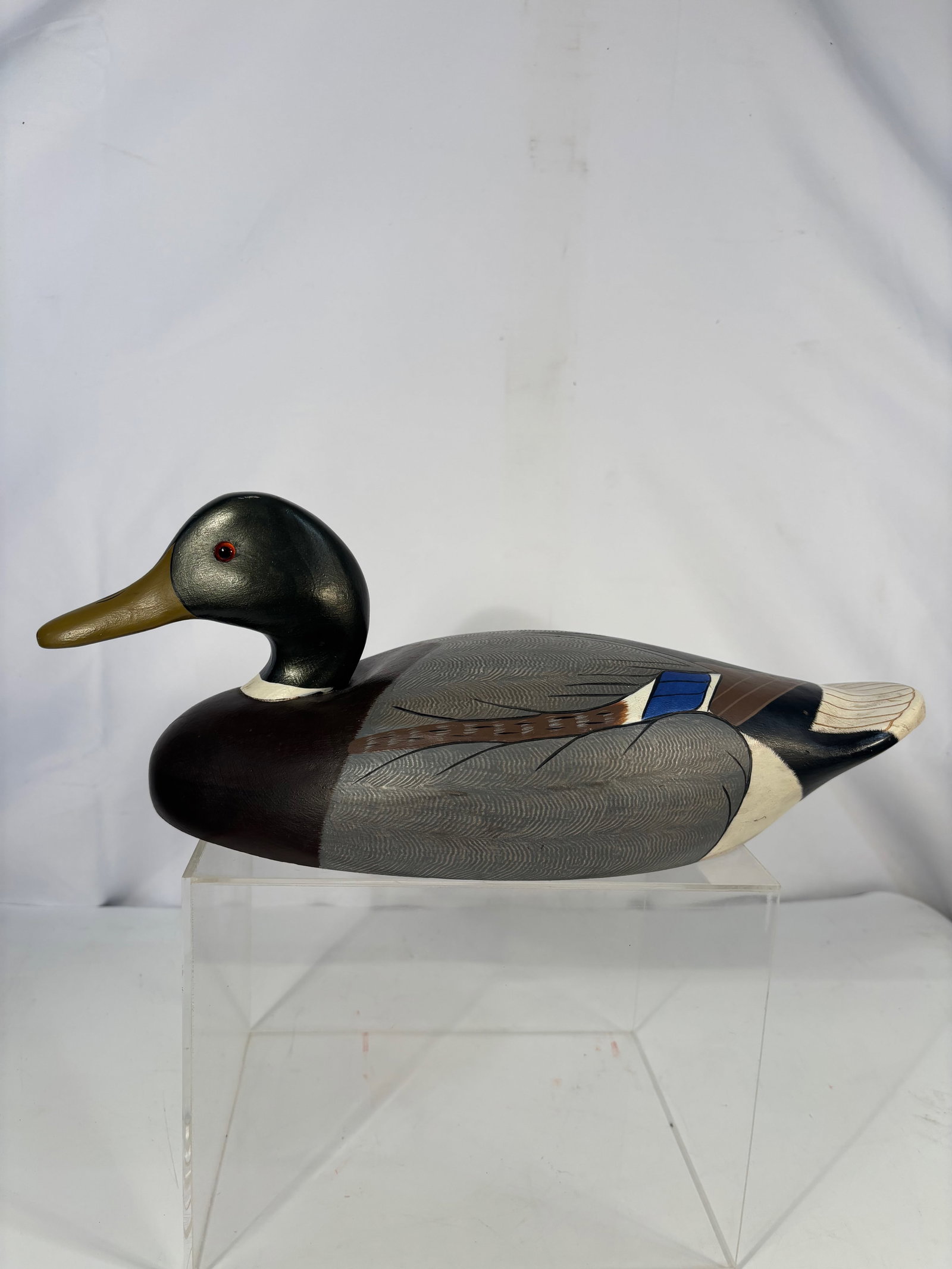 Ethan Allen Hand-Painted Mallard Duck Decoy: Decorative hand-painted mallard duck decoy by Ethan Allen. Finely carved and painted with realistic detailing, including feather texturing, blue wing speculum, and painted eye. The underside is stampe