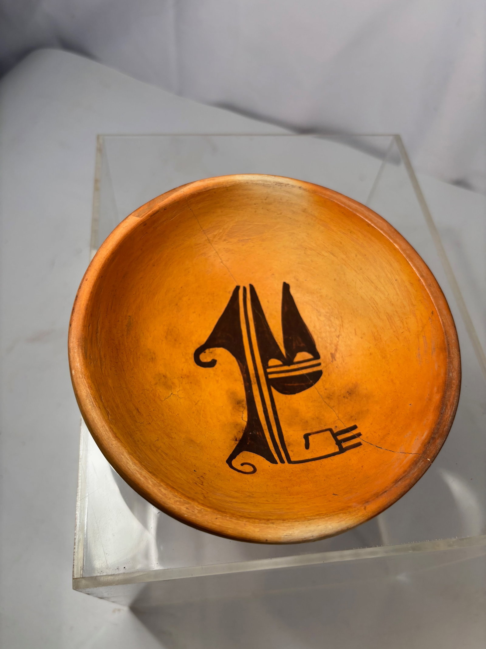 Southwestern Hopi-Style Hand-Coiled Pottery Bowl with Bird Motif: Southwestern Pueblo-style polychrome pottery bowl, likely Hopi or Hopi-inspired, featuring a stylized avian / Katsina abstract motif painted in black within the interior. The bowl is hand-coiled with 