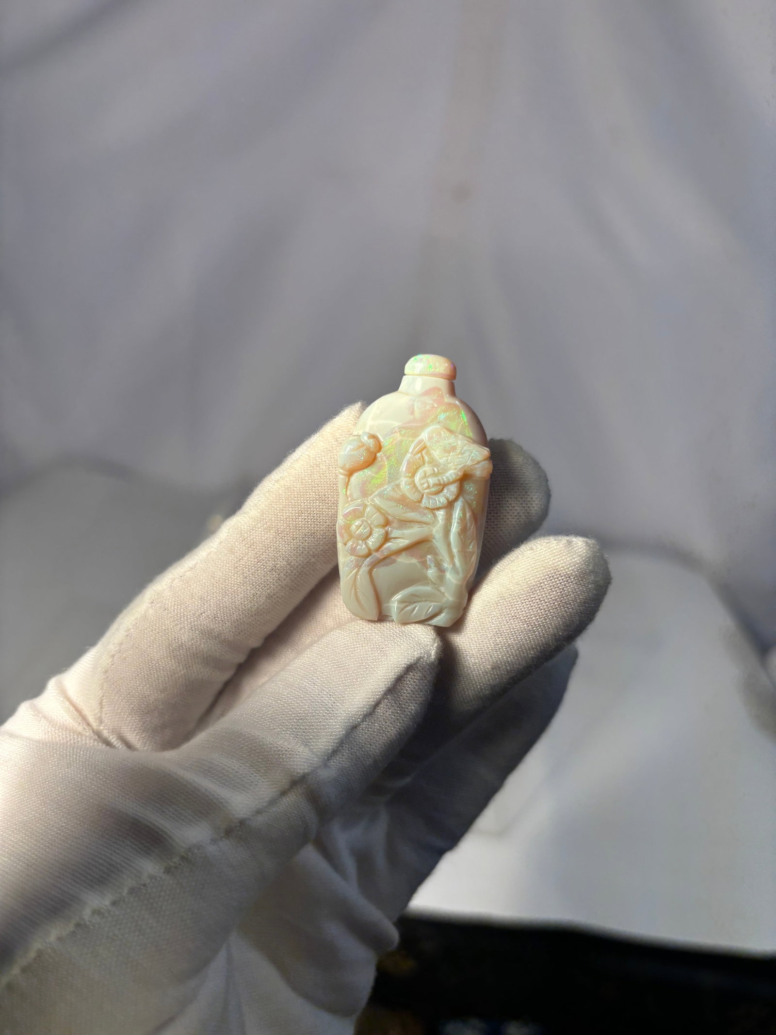 A Chinese Carved Opal Snuff Bottle (1 of 9)