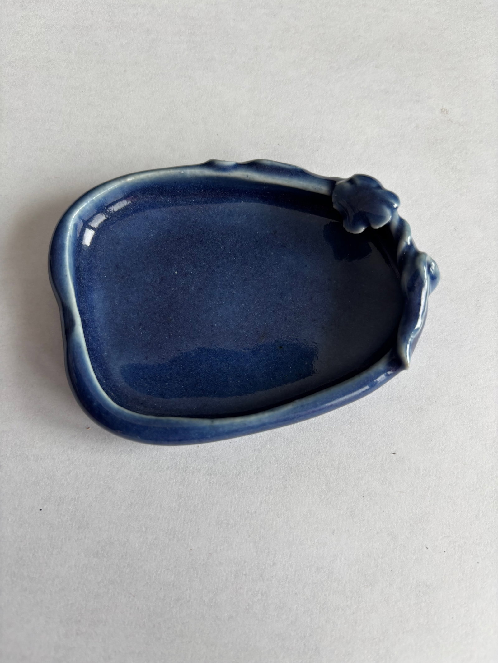 A Japanese blue glazed water dropper tray: Japanese Meiji-era (1868–1912); The form and glaze suggest it may be a scholar’s desk item, such as an inkstone tray or water dropper tray, often used in calligraphy or painting. Dimensions?Length