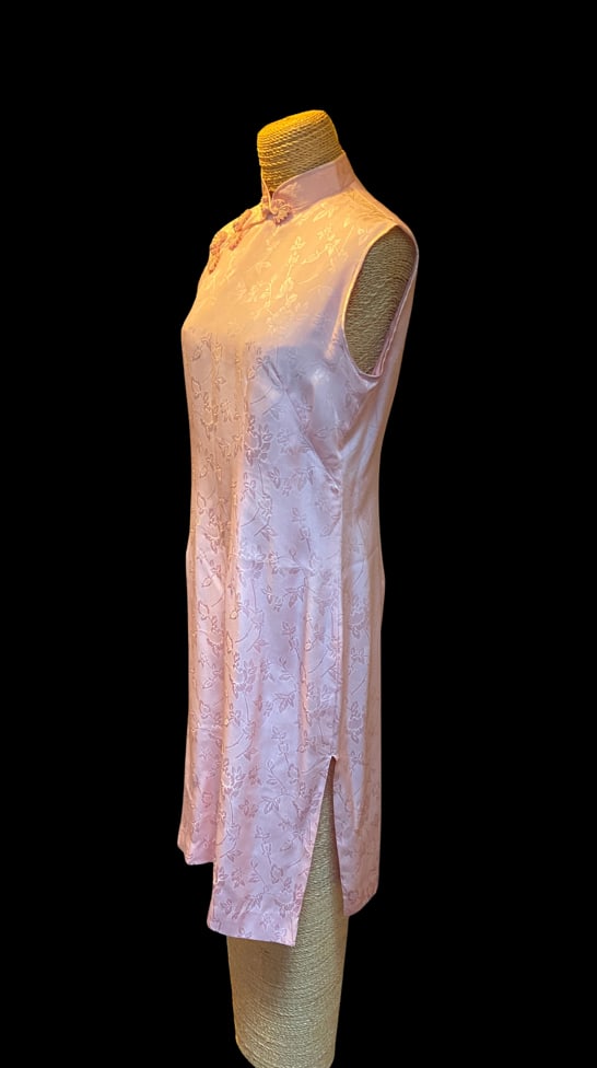 Vintage Peony Brand Shanghai Pink Silk Jacquard Cheongsam (Qipao): Vintage Peony Brand (???) Shanghai silk jacquard qipao in a soft blush pink color. Woven with an elegant all-over floral and lotus motif, featuring a Mandarin collar, traditional frog closures, concea