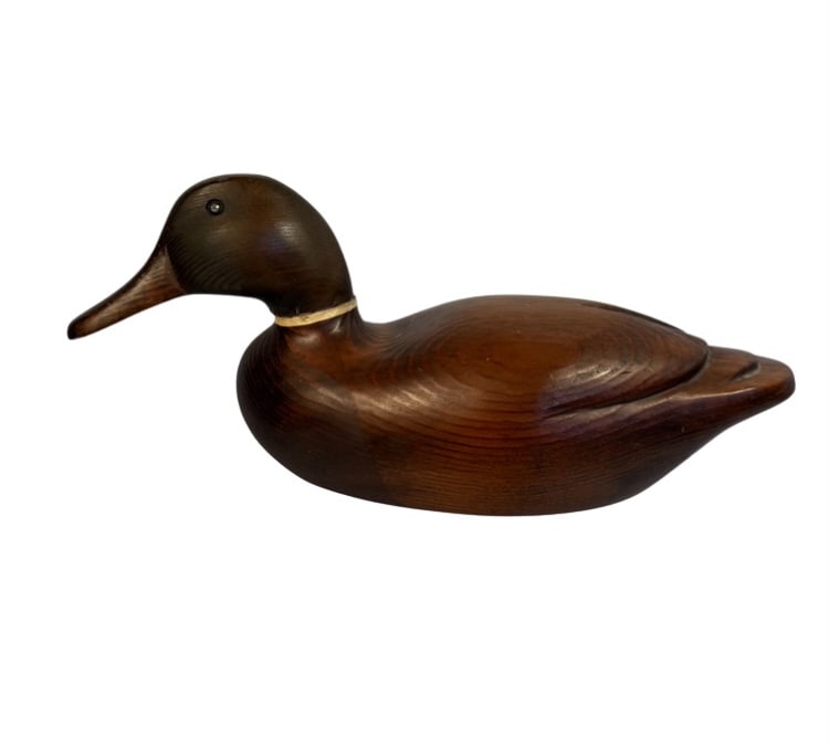 Vintage Hand-Carved Stained Wood Mallard Drake Decoy: A vintage hand-carved wooden mallard drake decoy featuring a dark green-black head, contrasting white neck ring, warm reddish-brown stained body, inset glass eyes, and relief-carved wing and tail deta