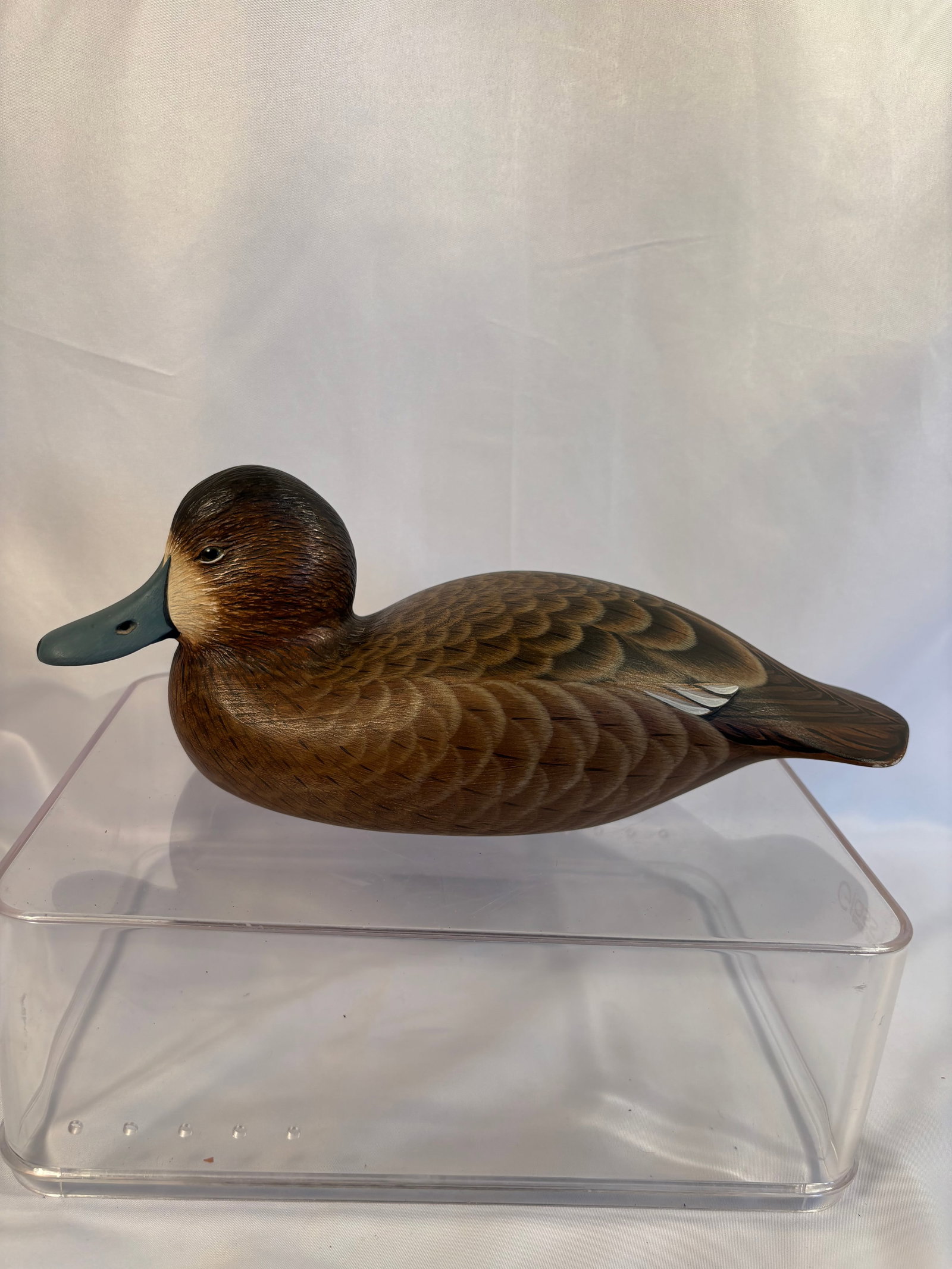 Armand J. Carney Signed 1989 Greater Scaup Hen Duck Decoy: A finely hand-carved and hand-painted wooden Greater Scaup hen by American wildlife artist and decoy carver Armand J. Carney. Realistically modeled with inset glass eyes, a blue-gray bill, and intrica