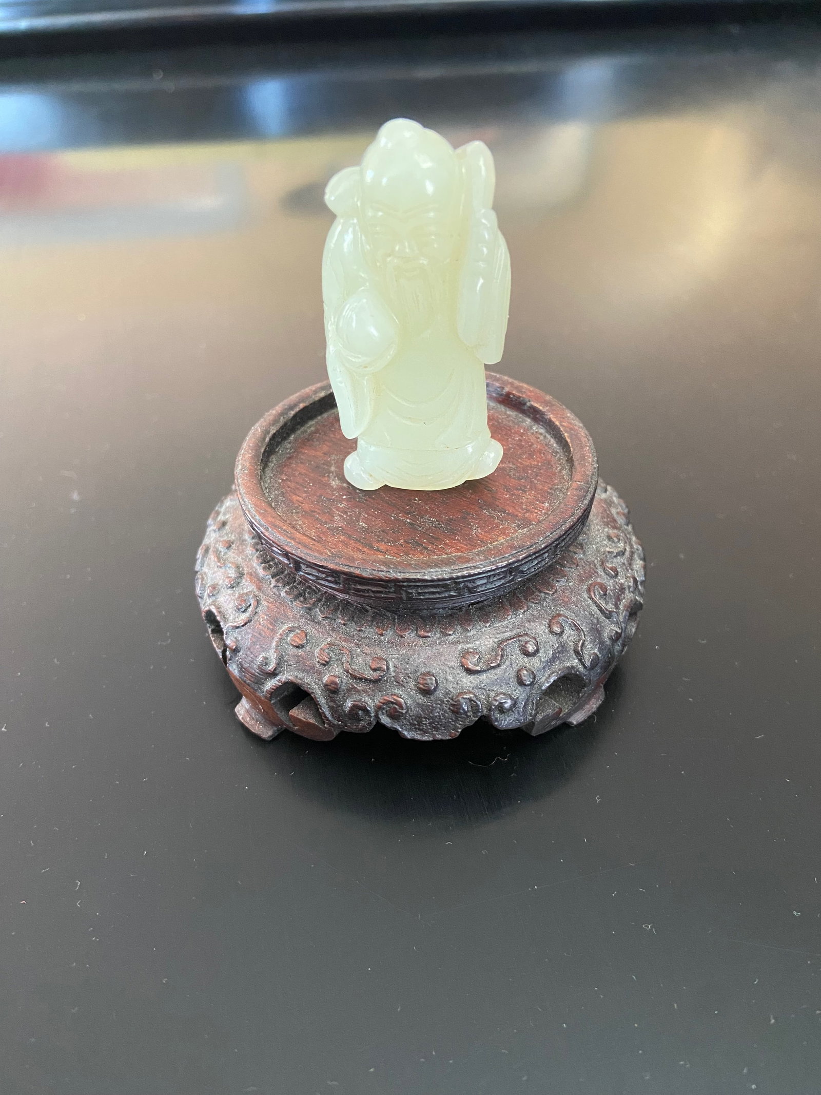 A Chinese nephrite jade old man statue: Qing Dynasty (1644-1912); Dimensions?Height: 2 inches