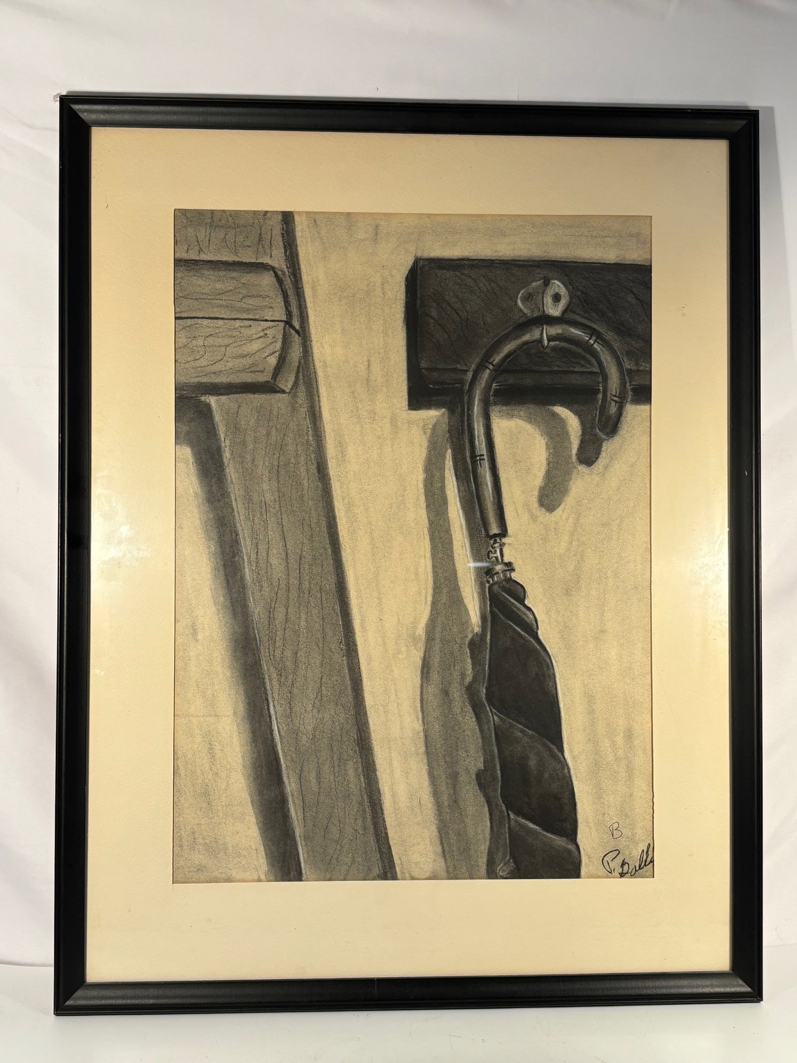 Paul Gallis (American, 1946–2003), Charcoal Still Life of Hanging Umbrella: A realist charcoal drawing of a wall-mounted hook with a hanging umbrella, signed B. Gallis lower right. Paul Gallis was a Chicago-born artist and professor of architecture, active in the later 20th c