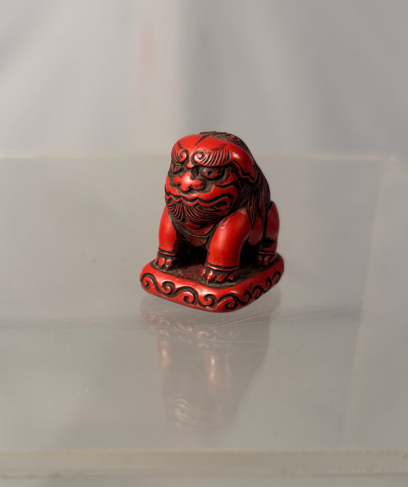 Japanese Tsuishu Carved Red Lacquer Netsuke of a Shishi on Base Edo period (1 of 9)