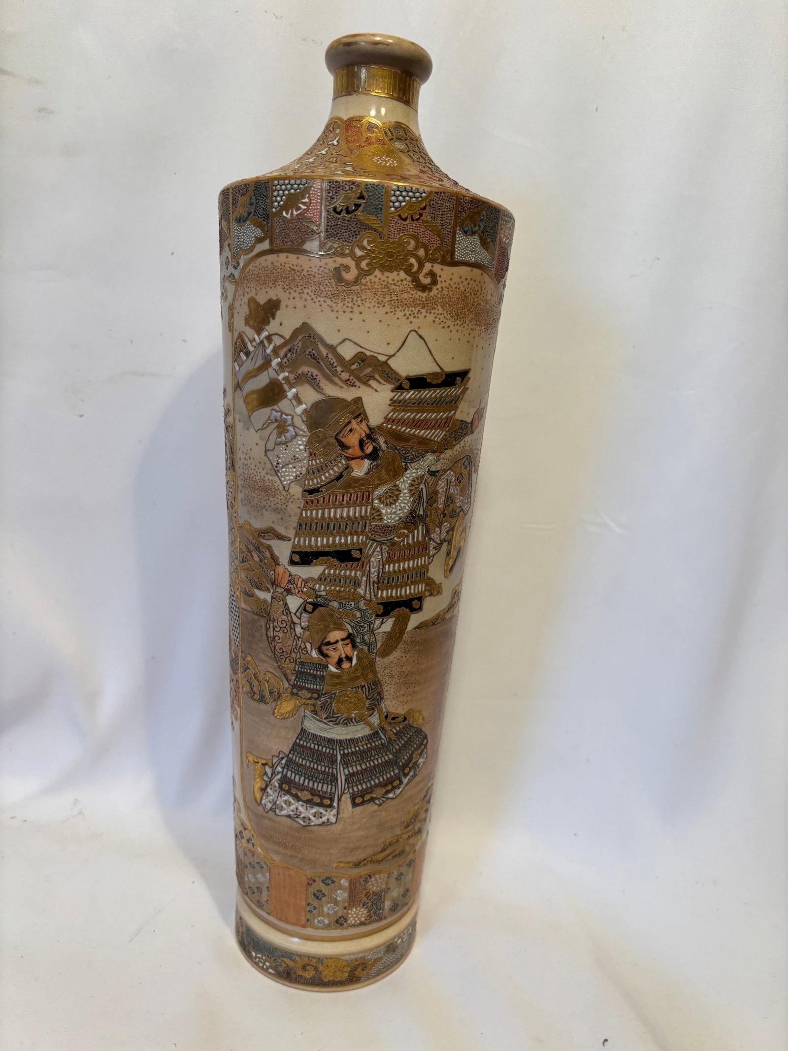 Large Japanese Meiji Period Satsuma Vase with Samurai & Court Figures, 17.5 Inches Tall: Large and impressive Japanese Meiji-period Satsuma earthenware vase, richly hand-painted with samurai warriors, court attendants, and mountainous landscape scenes. The vessel is decorated with intrica