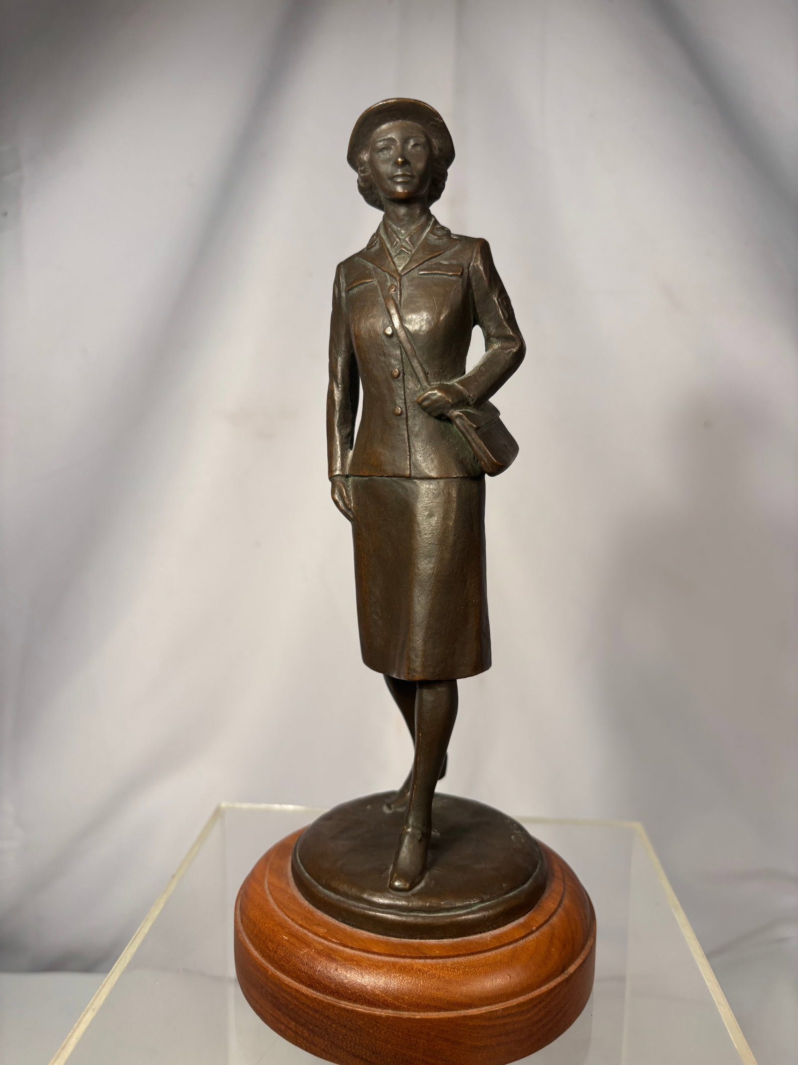 U.S. Navy WW II, WAVE Bronze-Like Statue By Fred Press: This is an authentic U.S. Navy WAVES (Women Accepted for Volunteer Emergency Service) Commemorative Statue. The bronze sculpture depicts a World War II-era female service member wearing a structured s