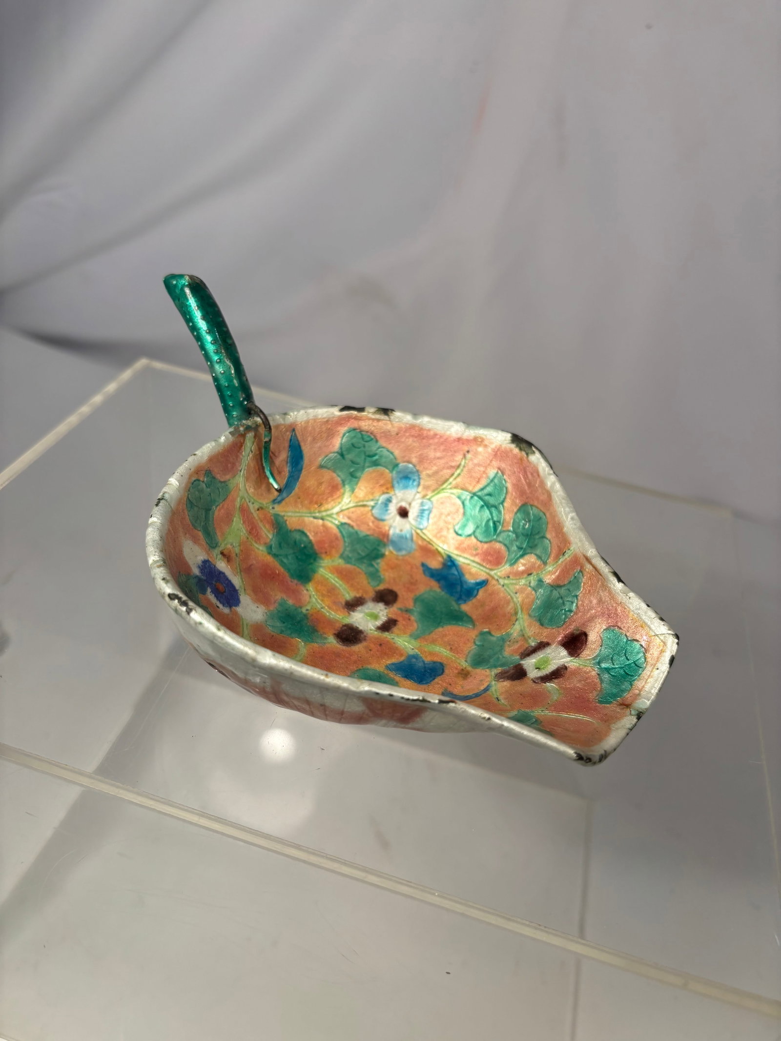 Vintage Chinese Enameled Mallow-Form Libation Cup, Marked China: A vintage Chinese enameled metal libation cup modeled in the form of an autumn mallow blossom. The interior is decorated with colorful flowering vines against a coral-orange ground, while the undersid