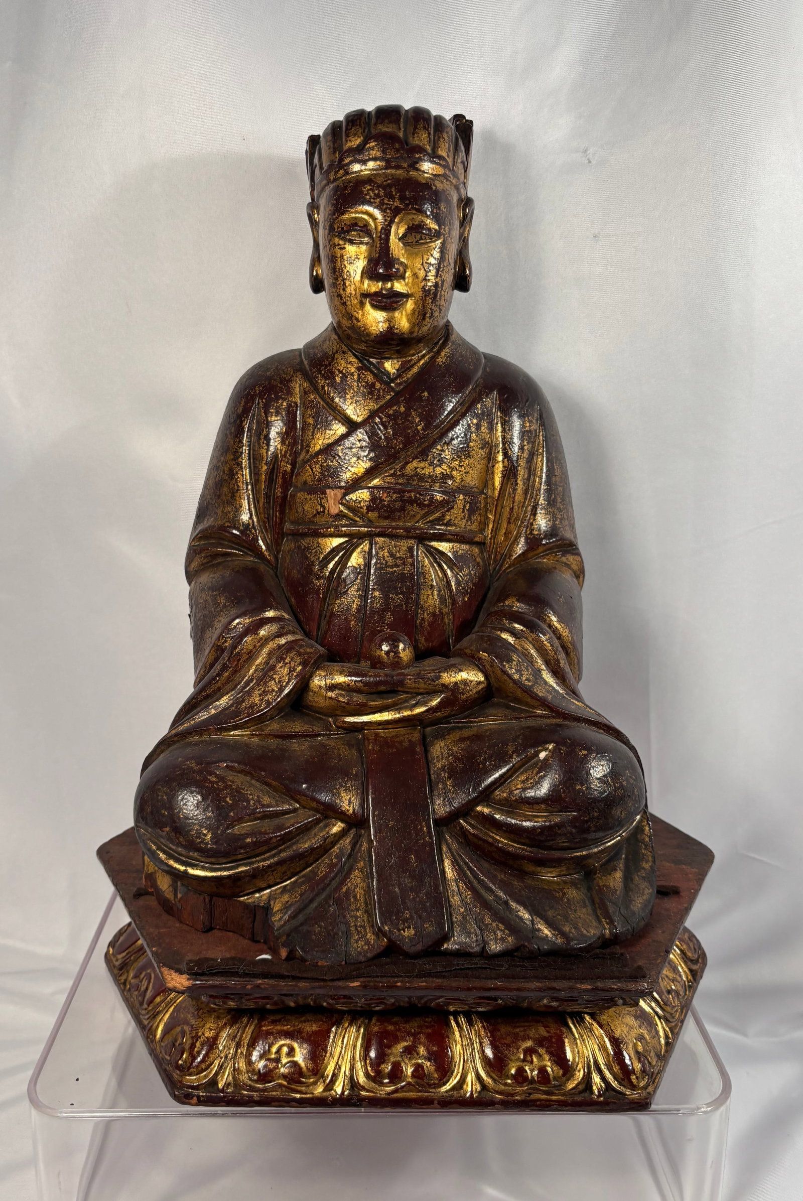 A Chinese Gilt and Lacquered Wood Figure of a Seated Taoist Deity (Wenchang Wang or Tianguan), 18th: This antique Chinese 18th century figure—likely depicting a Taoist deity such as Wenchang Wang or Tianguan—is masterfully hand-carved from wood and finished using traditional multi-layered red lac
