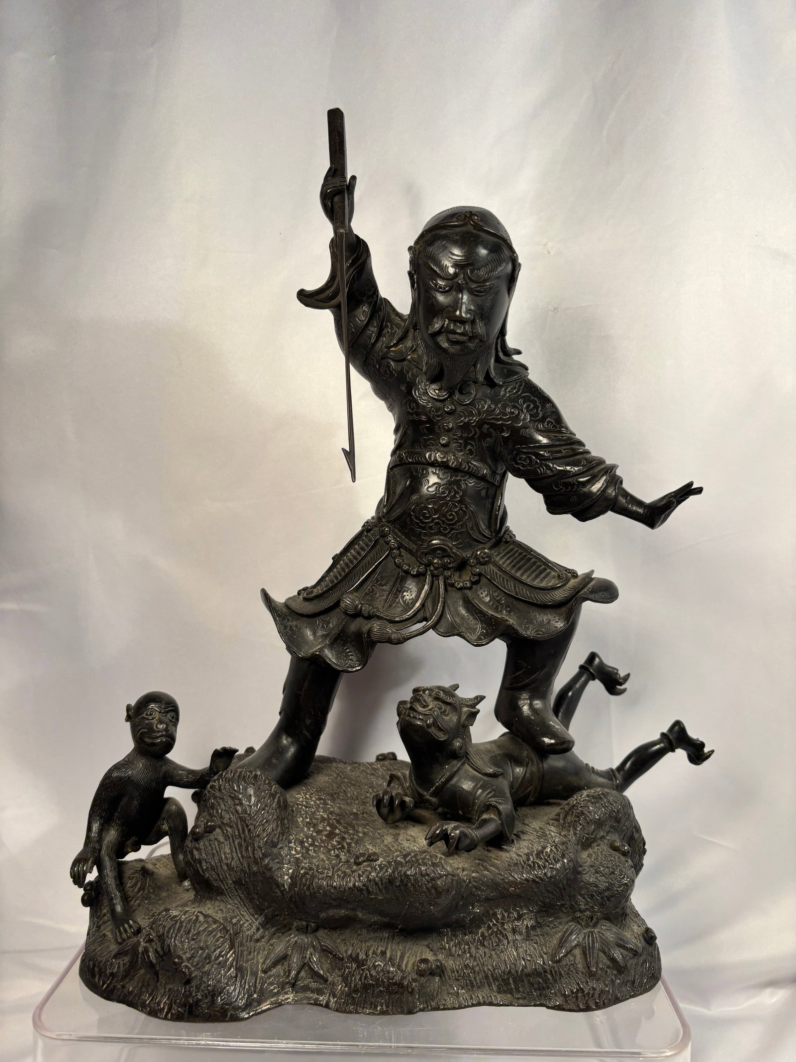 A Japanese Bronze Figure of Bishamonten Subduing an Oni, Japanese School, Meiji Period () (1 of 16)
