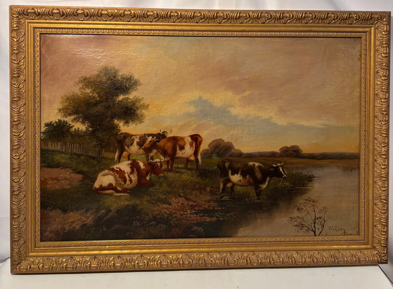W. Gully Signed Pastoral Landscape with Cattle, Oil on Canvas: An oil-on-canvas pastoral landscape depicting a herd of cattle resting and drinking along the banks of a tranquil river. The animals are set beneath a luminous golden sky, with mature trees, open fiel