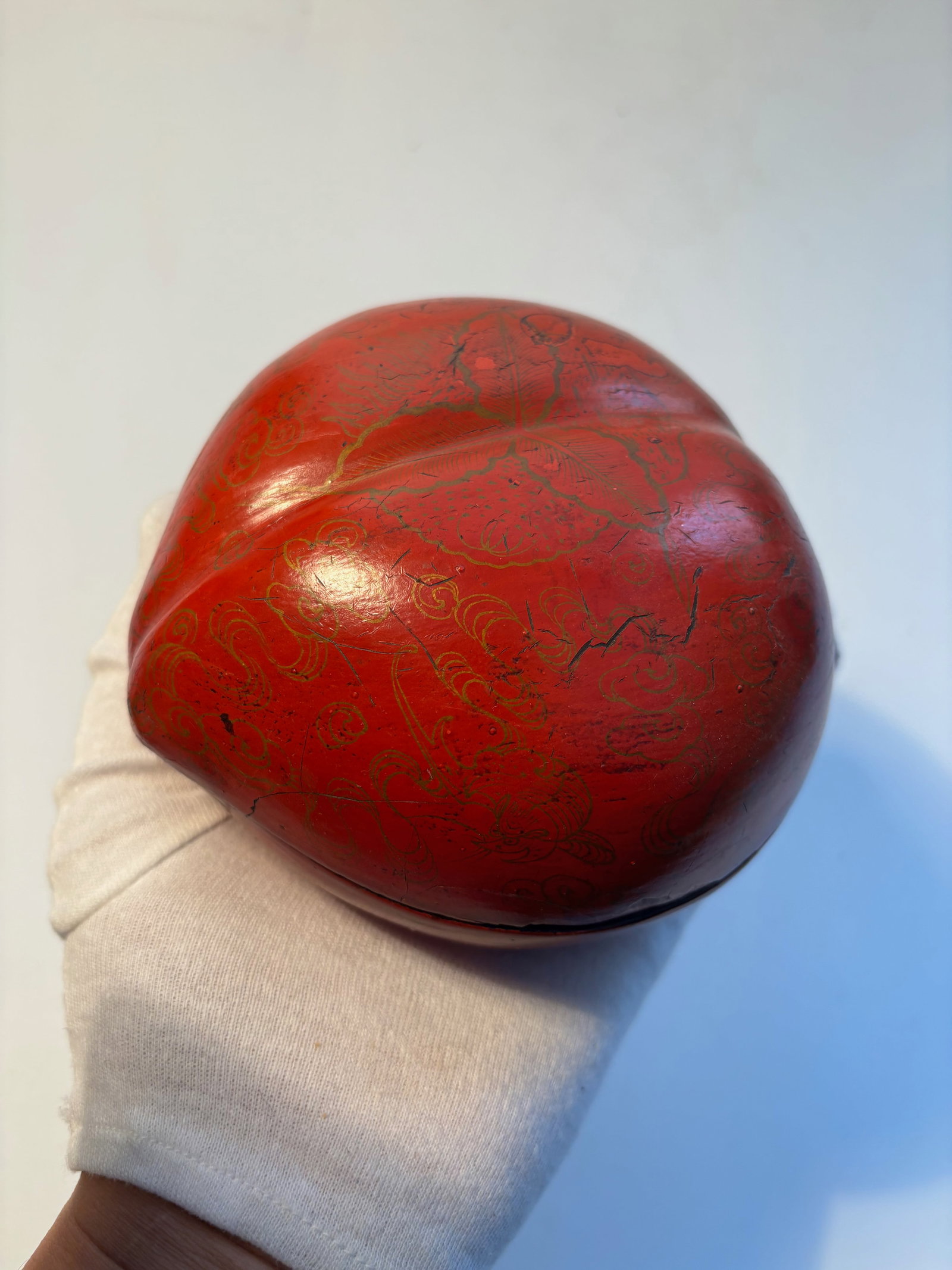 A Chinese red lacquer peach box: 19th century, Dimensions?Length: 5.5 inches