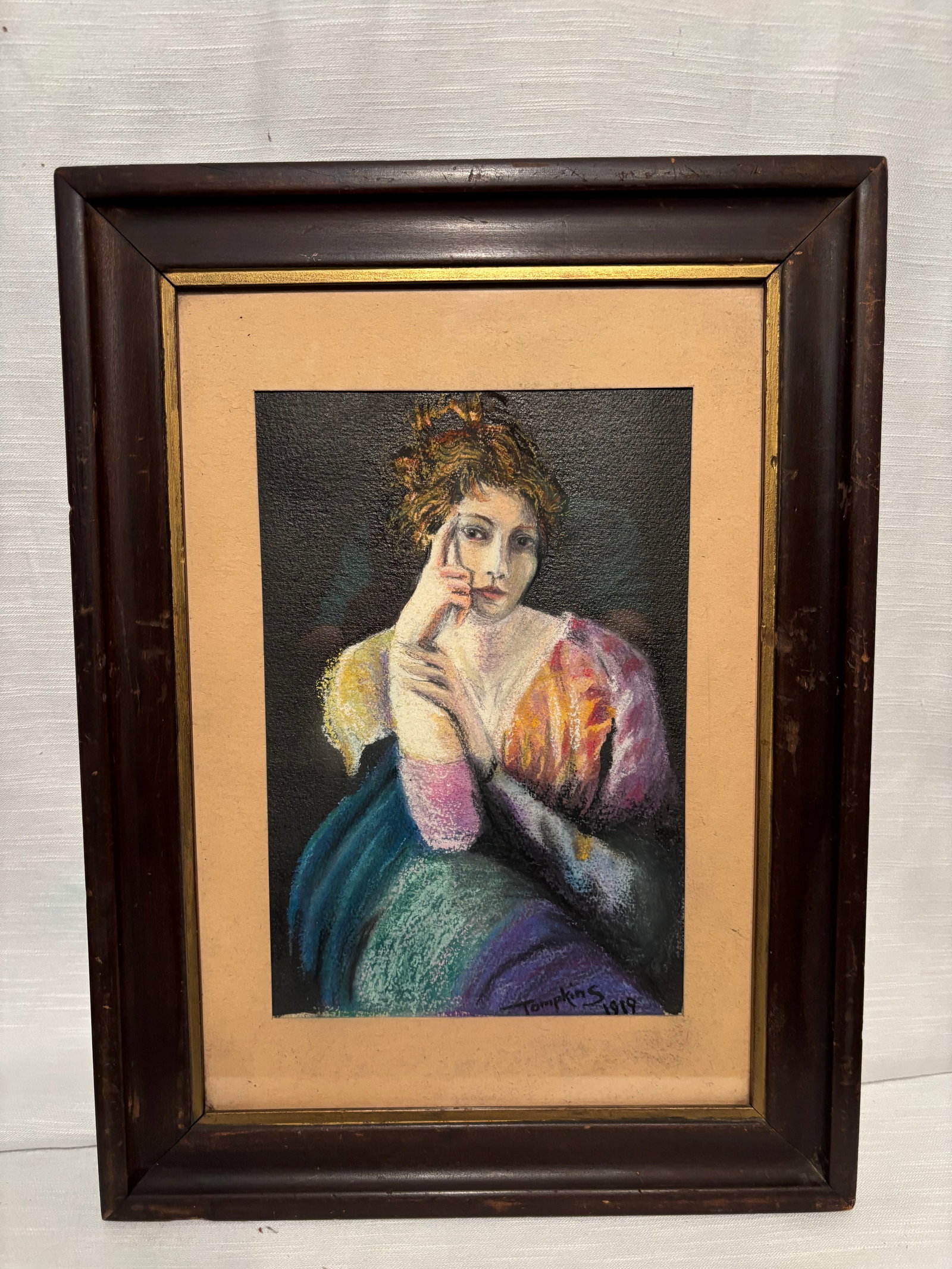 Signed 1919 Portrait of Woman, Mixed Media Pastel & Gouache, John Tompkins, Framed: A striking mixed media portrait of a young woman, executed in pastel, charcoal, and gouache with a richly textured surface. The artist employs vibrant color alongside soft modeling to create a luminou