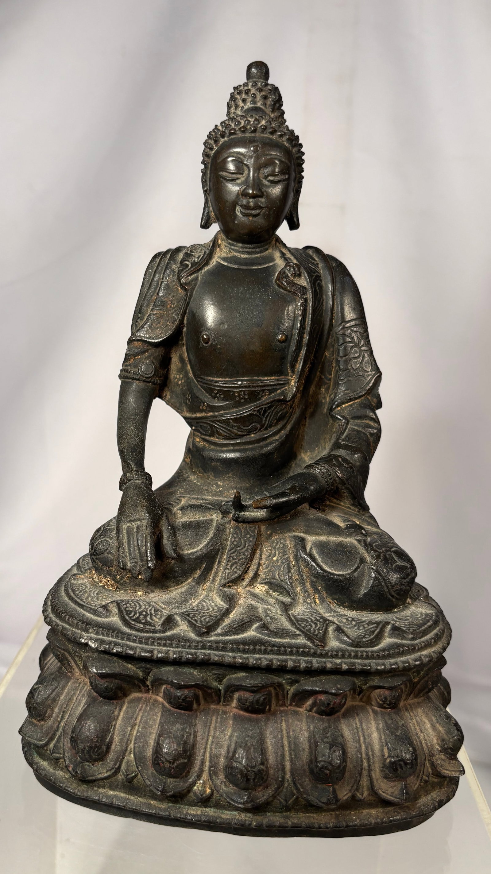 A Chinese Bronze Seated Buddha Figure possibly Ming Dynasty (1 of 14)
