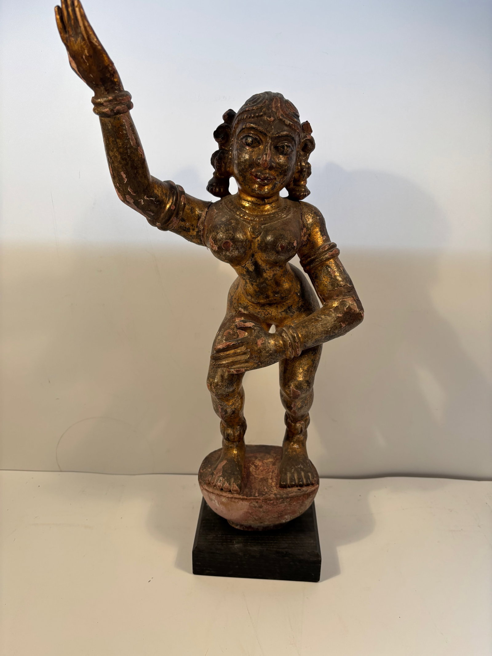 A Tall Antique Indian wood carved statue: 19TH Century , Dimensions?Height: 19 inches with base.