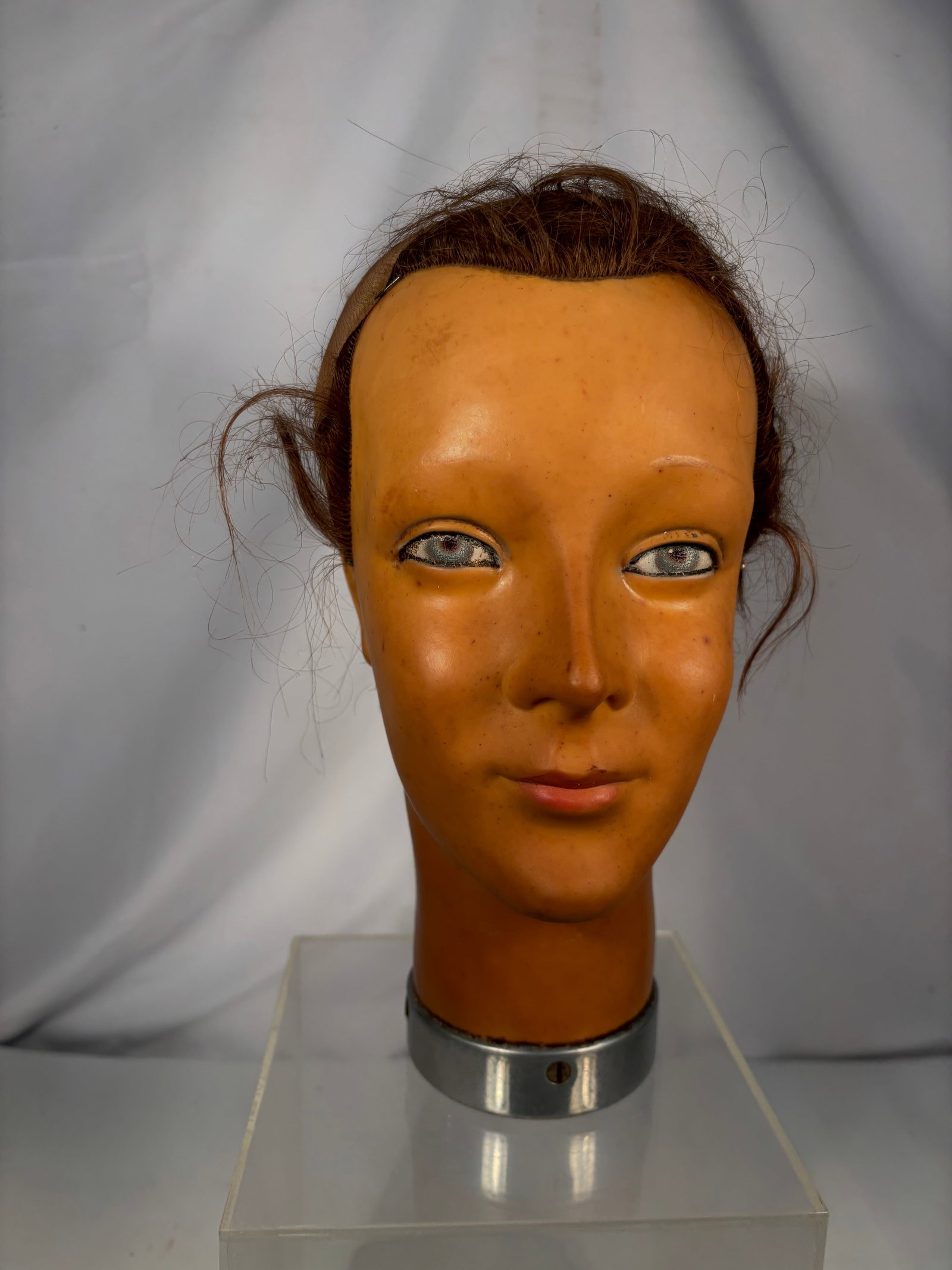 Vintage Mid-Century German AK Cosmetology Mannequin Head with Human Hair: Vintage mid-century cosmetology and hairdressing training mannequin head, manufactured in Germany and embossed “AK / Made in Germany” near the base. The molded female head features hand-painte