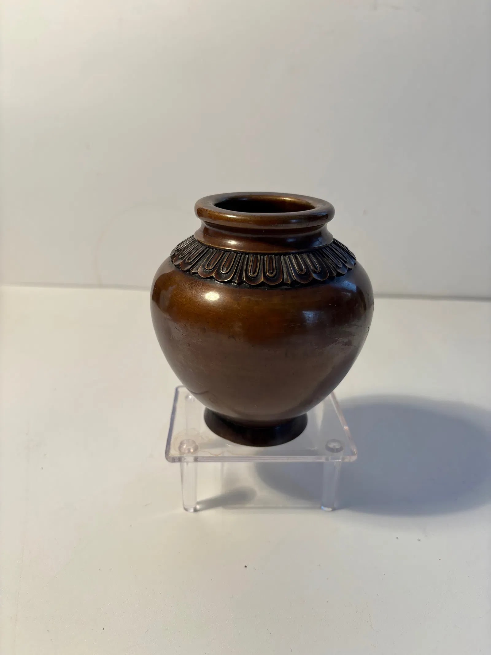 A Chinese ritual-style bronze vessel: Qing Dynasty (1644-1912), Round body with a short neck and flared mouth—very similar to a lotus jar, water vessel, or incense container ,nice old patina.Dimensions? Height: 4.25 INCHES