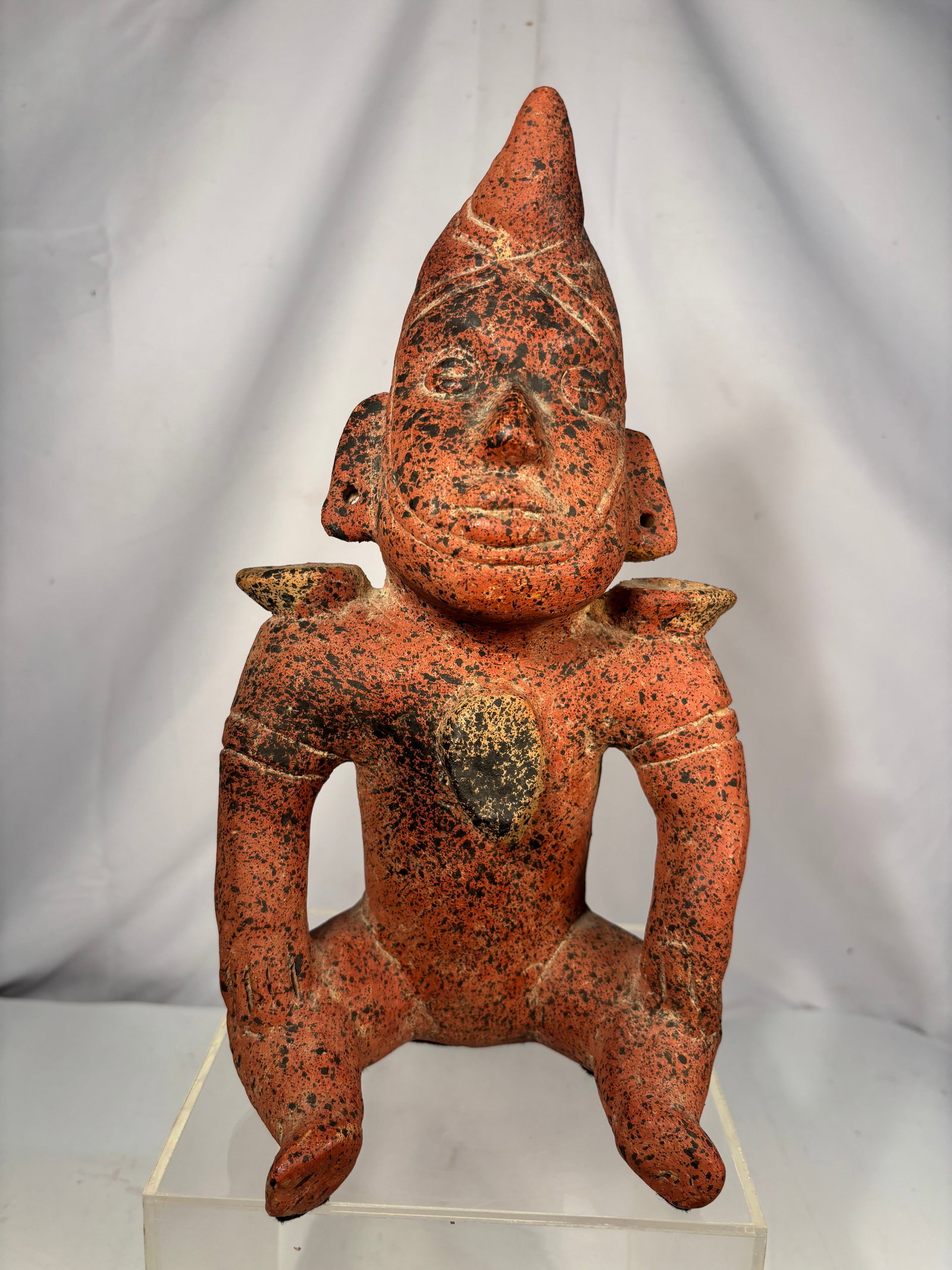 Large Pre-Columbian Style Colima Comala Hollow Effigy Shaman Figure Vessel Redware: This striking terracotta effigy vessel is crafted in the distinctive Pre-Columbian Comala style native to the West Mexican state of Colima, featuring a hollow interior designed to hold ceremonial liqu