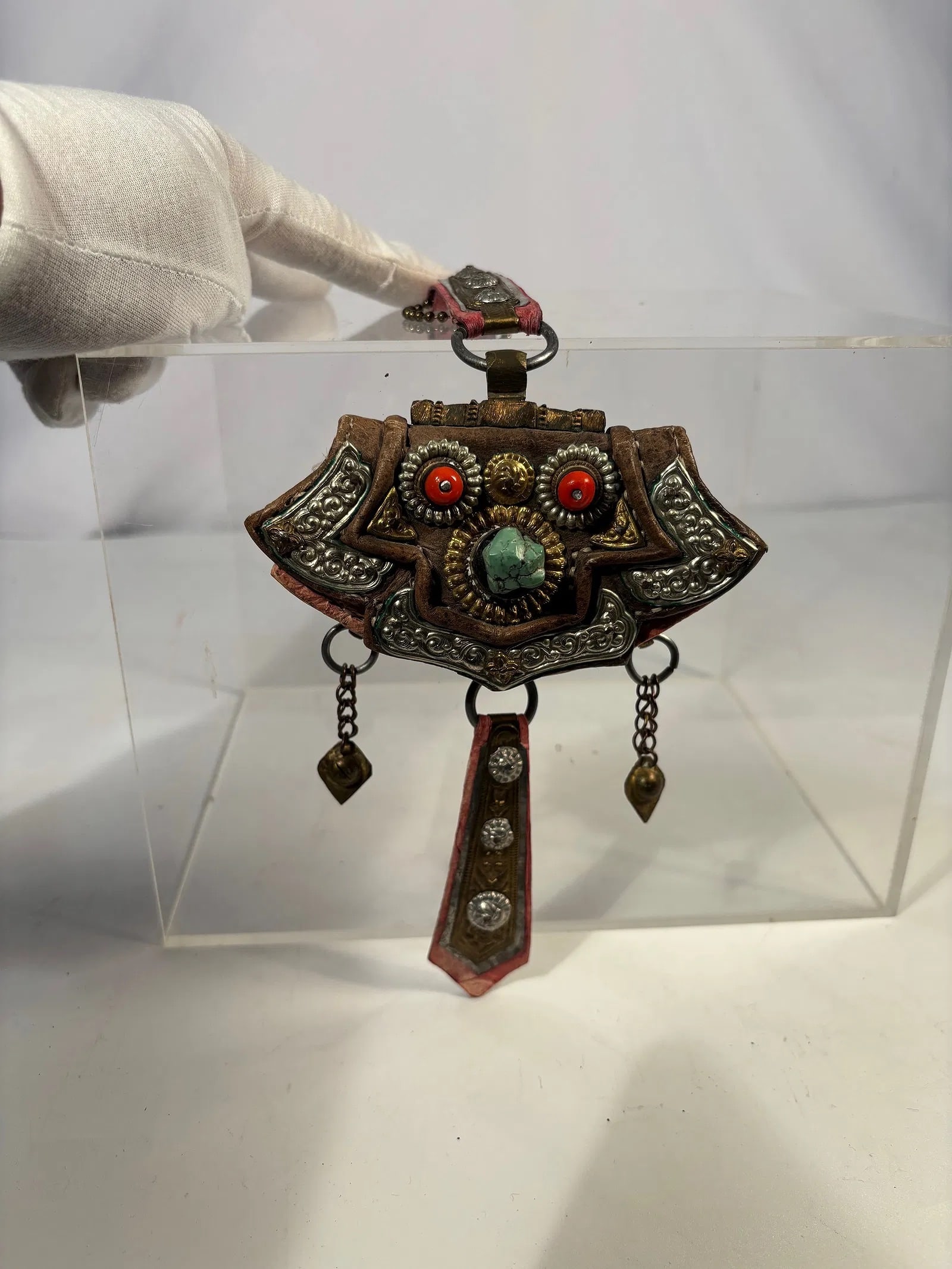 A Tibetan Leather Gau Amulet with gilted Brass Studs and Pendant Drops, 19th century (1 of 14)
