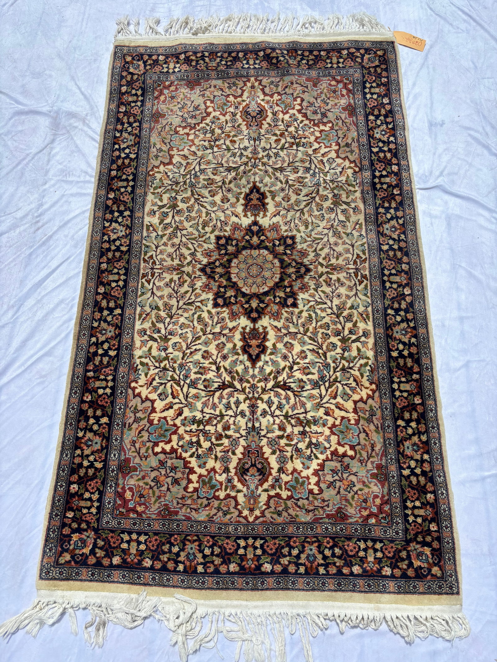 Hand-Knotted Persian Kashan Style Area Rug 71 x 36 inches.: Finely hand-knotted Persian Kashan-style area rug featuring an ivory field with elaborate floral vine and medallion motifs in navy, burgundy, soft blue, and earth-tone colors. Intricate scrolling flor