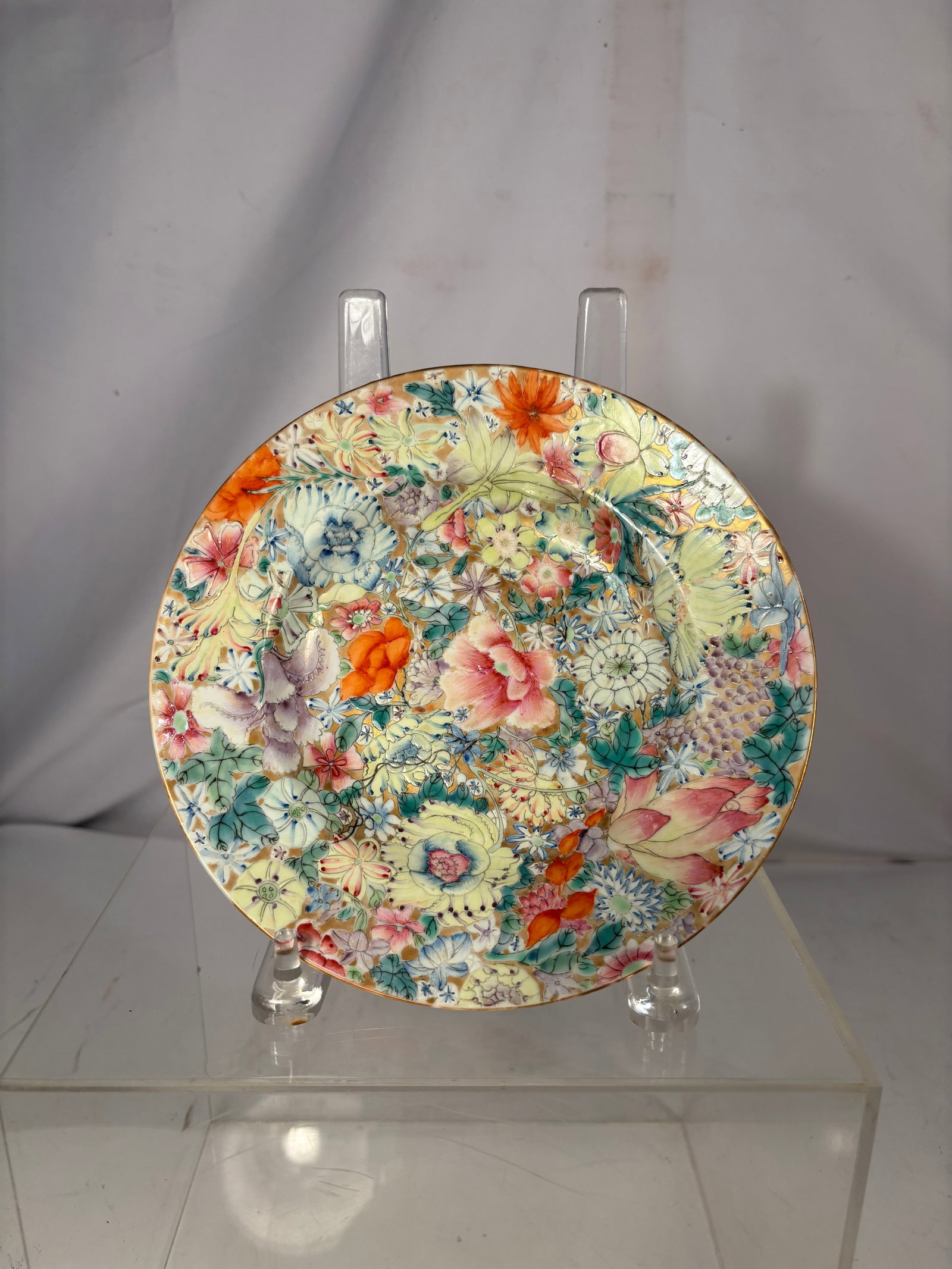 Chinese Qing-Dynasty Guangxu-Period Famille-Rose Millefleurs Porcelain Dish (Guangxu period,: A Chinese famille-rose porcelain dish dating to the Guangxu period of the Qing dynasty. The interior is densely decorated in the celebrated millefleurs, or “hundred flowers,” pattern, featurin