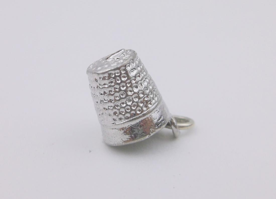 Stunning Antique Sterling Sewing Thimble Charm: very thick and heavy, has some scratches and dents as shown, solid sterling silver