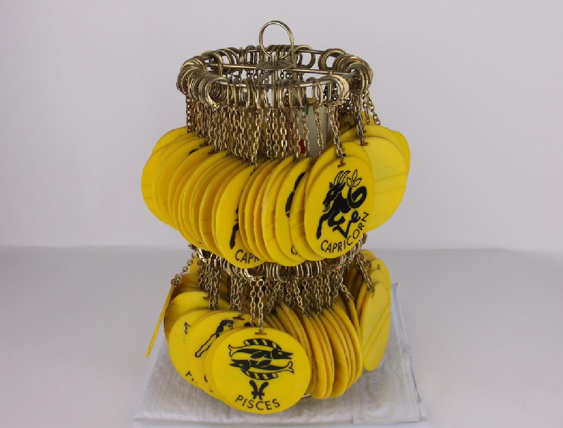 Vintage Astrological Keychain Rack: you get all, tons of astrological keychains on rack, all vintage, great for resale