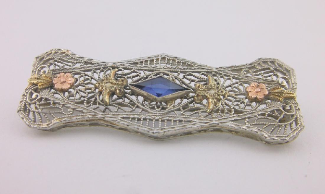Incredible Art Deco 10kt Gold Sapphire Brooch: An Incredible 1920s Antique Art Deco 10kt White and Yellow Gold with Genuine Sapphire Brooch. In Superb Condition, absolutely stunning.
