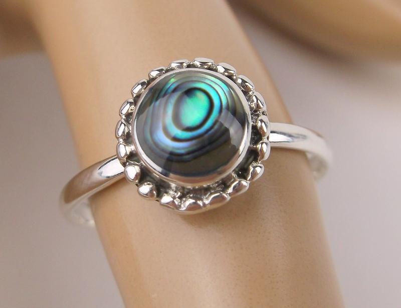 New Sterling Silver Abalone Ring Size 8: Solid Sterling Silver Guaranteed, in Brand New Never Worn Condition.
