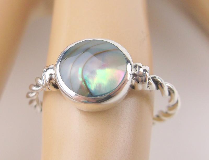 New Sterling Silver Abalone Ring Size 8: Solid Sterling Silver Guaranteed, in Brand New Never Worn Condition.