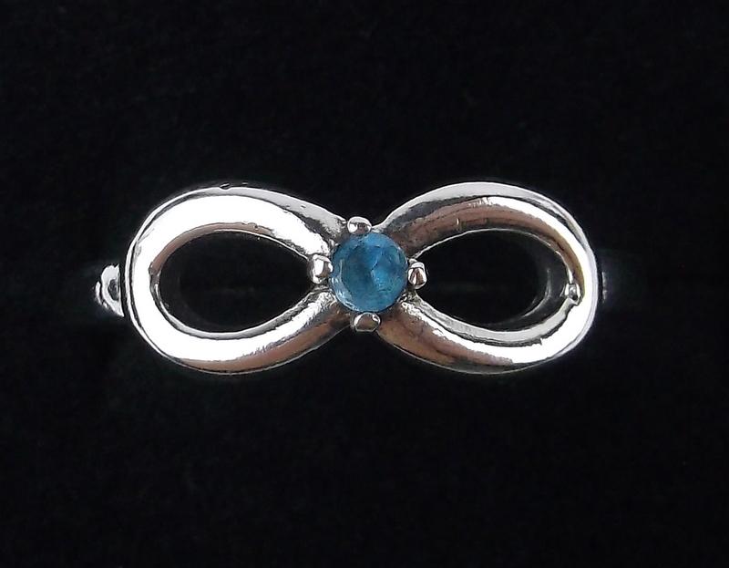 Stunning Sterling Silver Infinity Ring 6.5 Blue Stone (1 of 2)